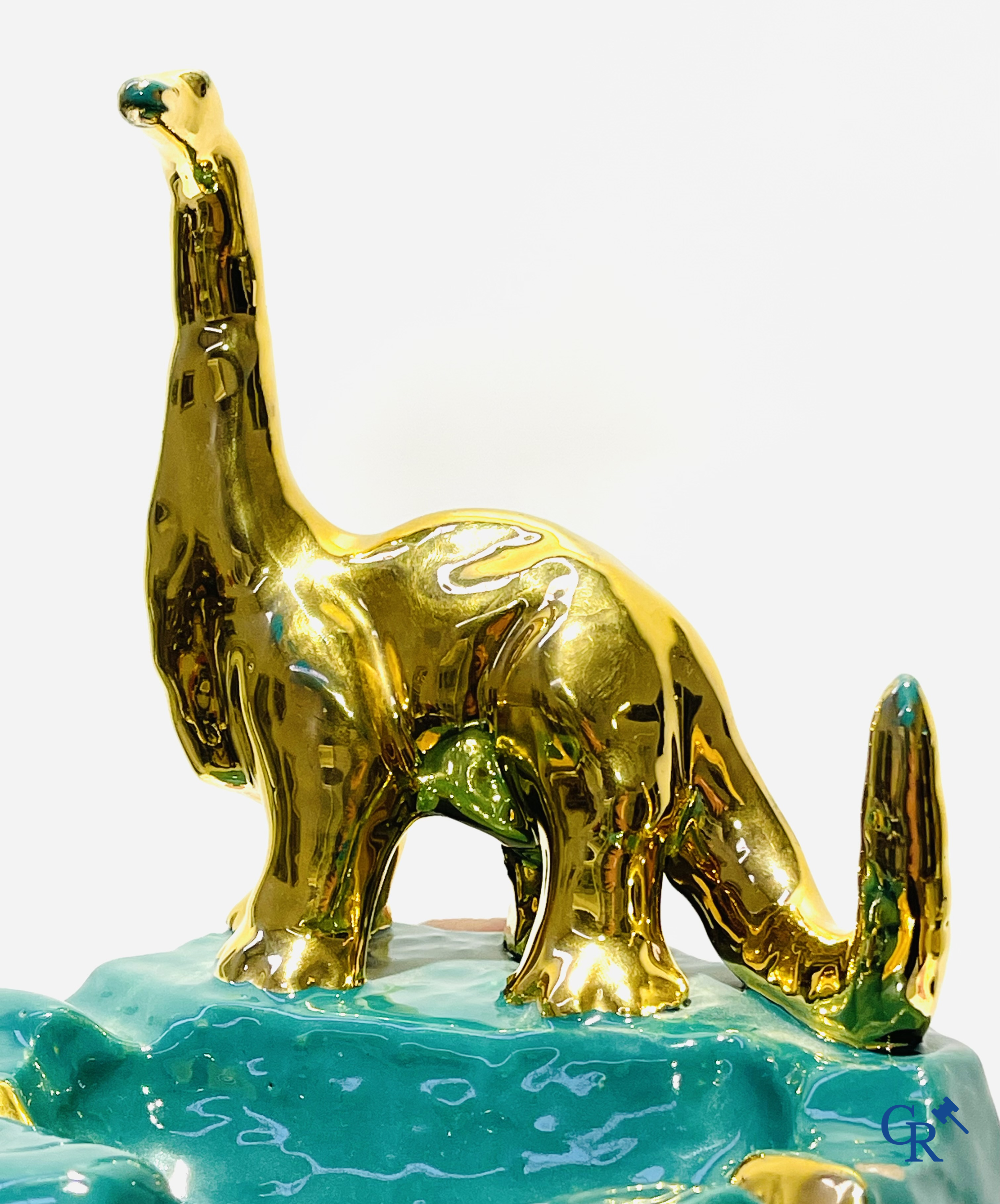 Sinclair. Publicity ashtray with a dinosaur in enamelled faience for the Sinclair Oil Corporation. 1950's.