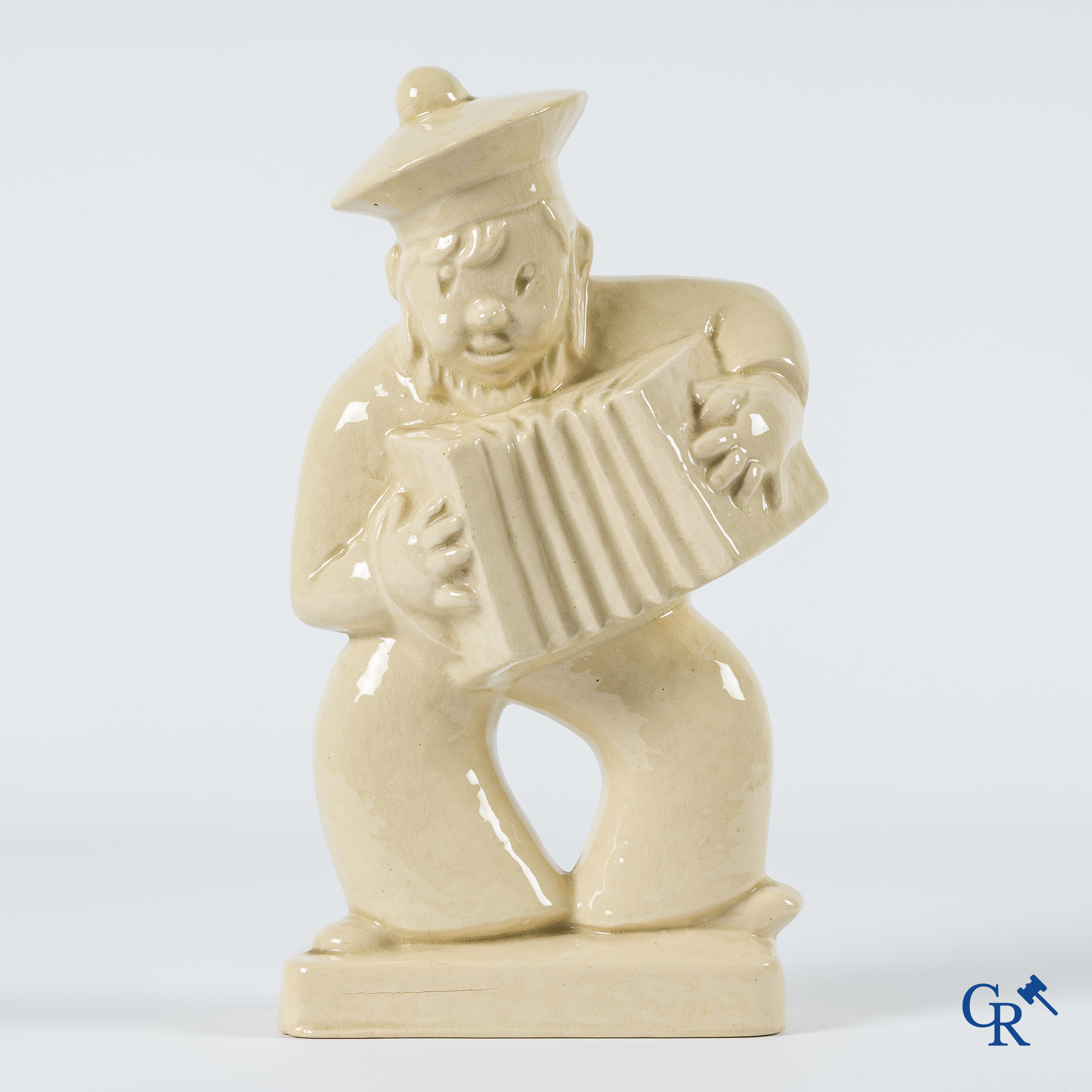 Art Deco. Sailor with accordion in typical French crackled glazed faience. Circa 1930.