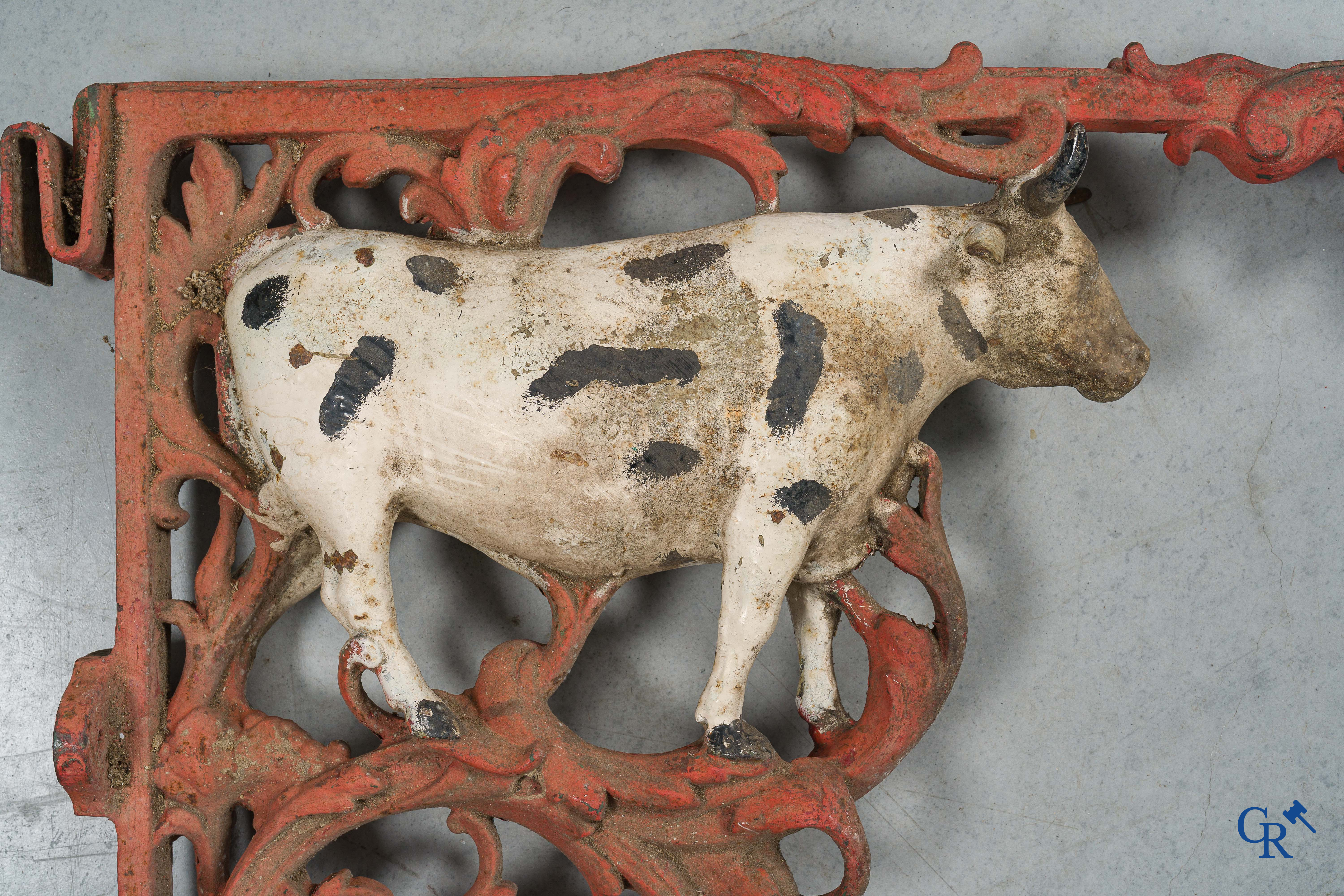 Liebig, Rare set of 2 enamel advertising signs suspended from a cast iron ox-shaped bracket. Around 1900.