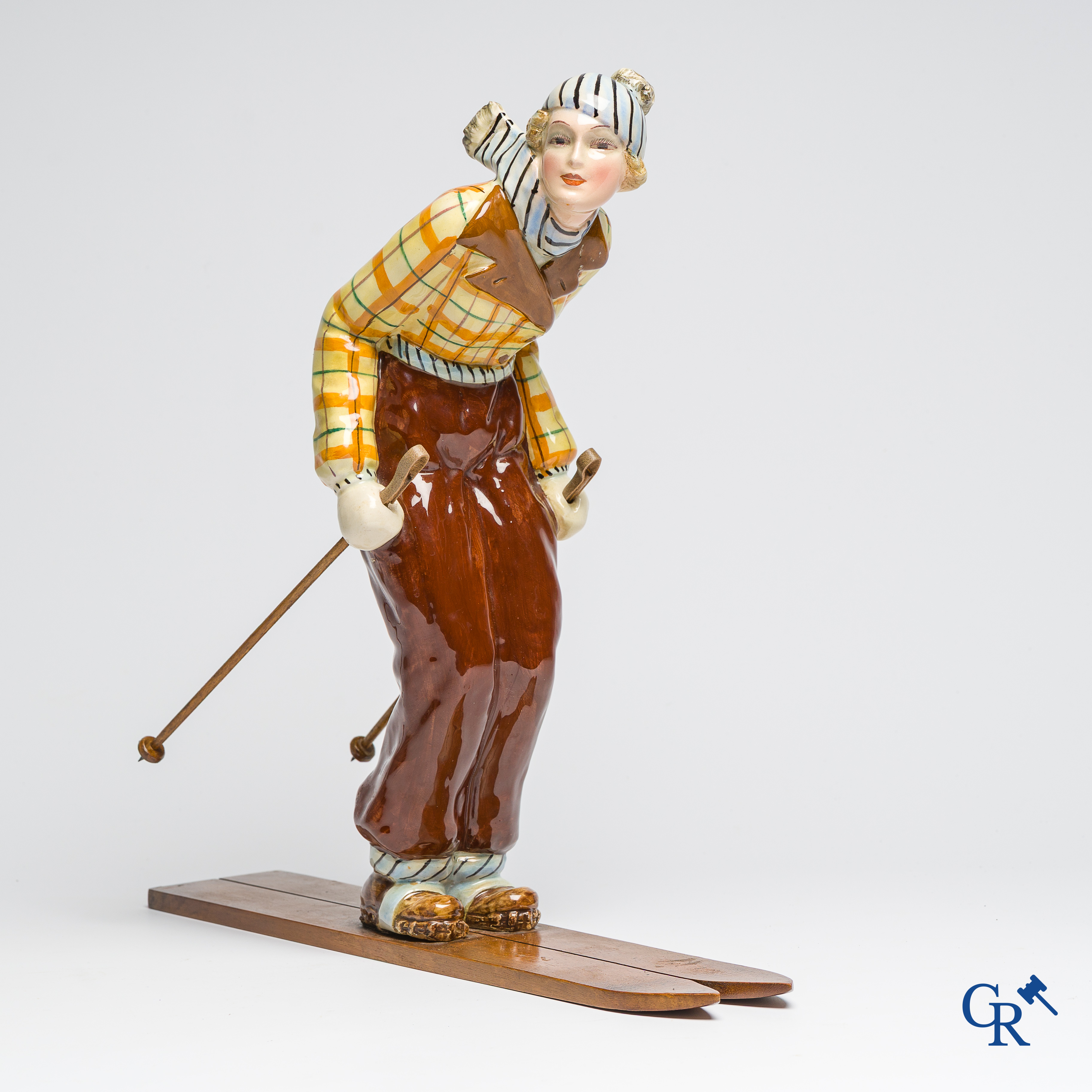 Art Deco, Hertwig and Company, Katzhütte, Thüringen. Skier in fine polychrome and glazed pottery. Circa 1930.