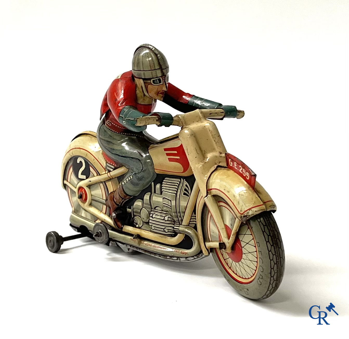 Technofix G.E. 255. Een mechanisch blikken speelgoed motorfiets. Made in U.S. - zone Germany.
