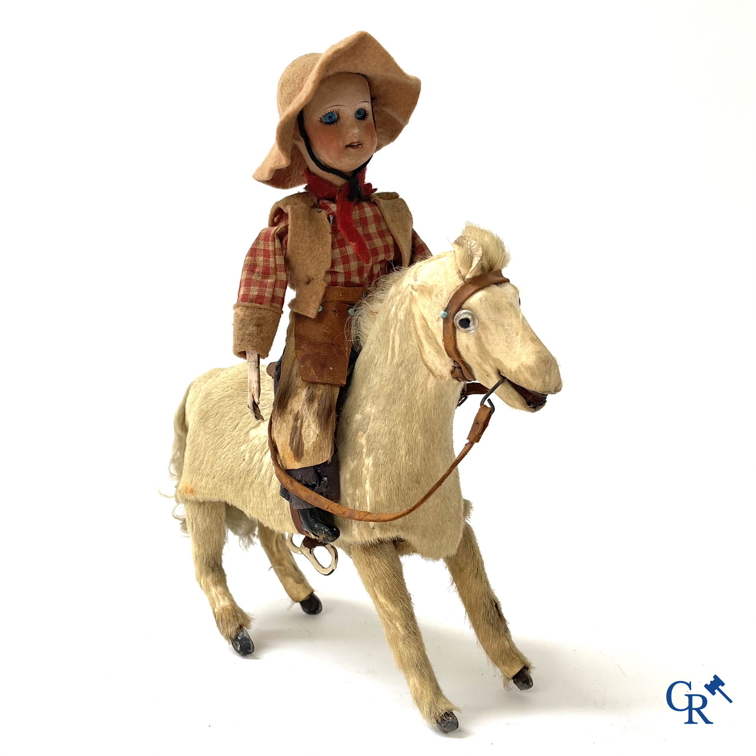 Jouets anciens. Roullet & Decamps. "Cheval sauteur cowboy" Jouet mécanique, cheval avec cow-boy. Circa 1910-1920.