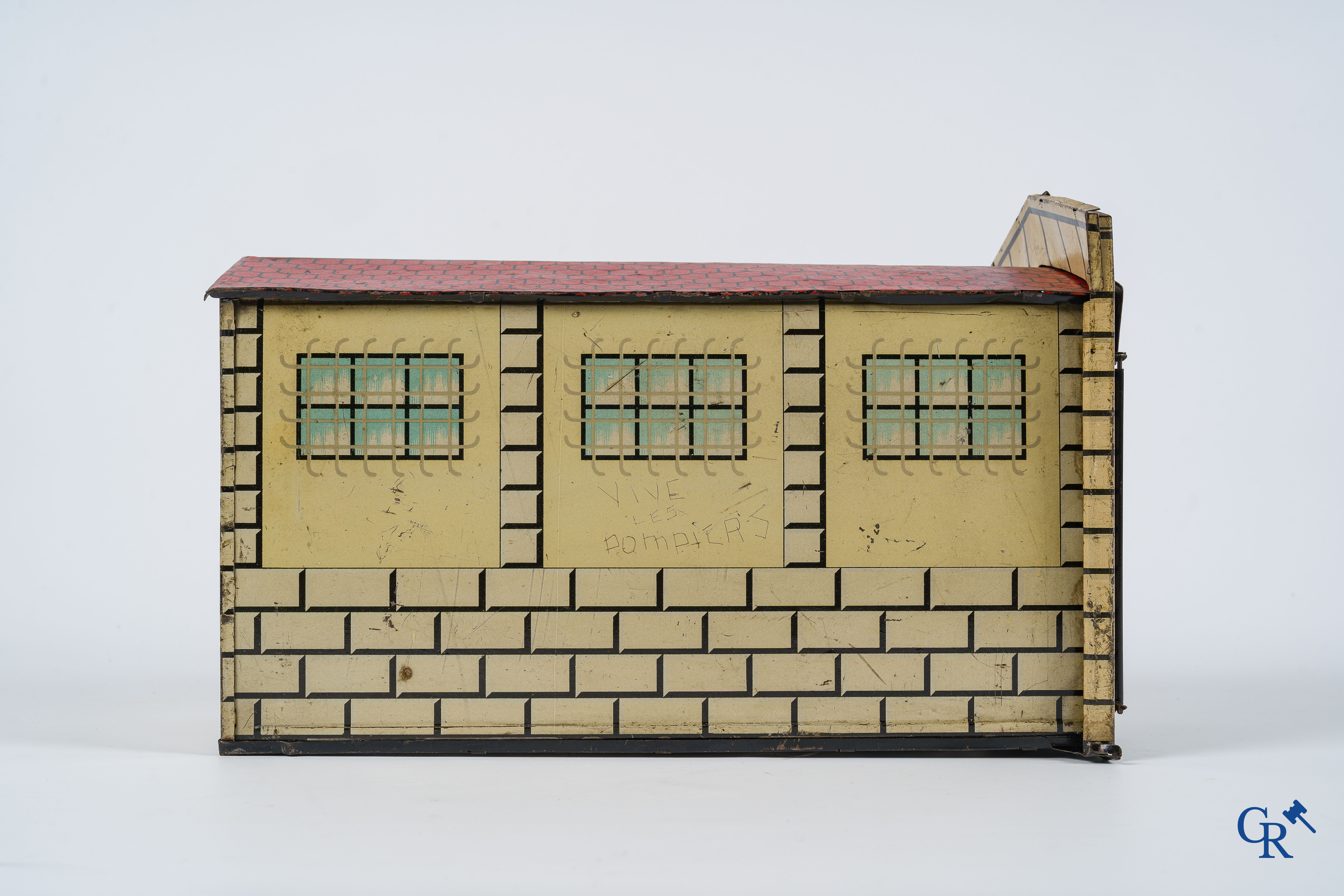 Old toys. Distler, Germany. Limousine with accompanying garage. Metal with winding mechanism. 1920's- 1930's.