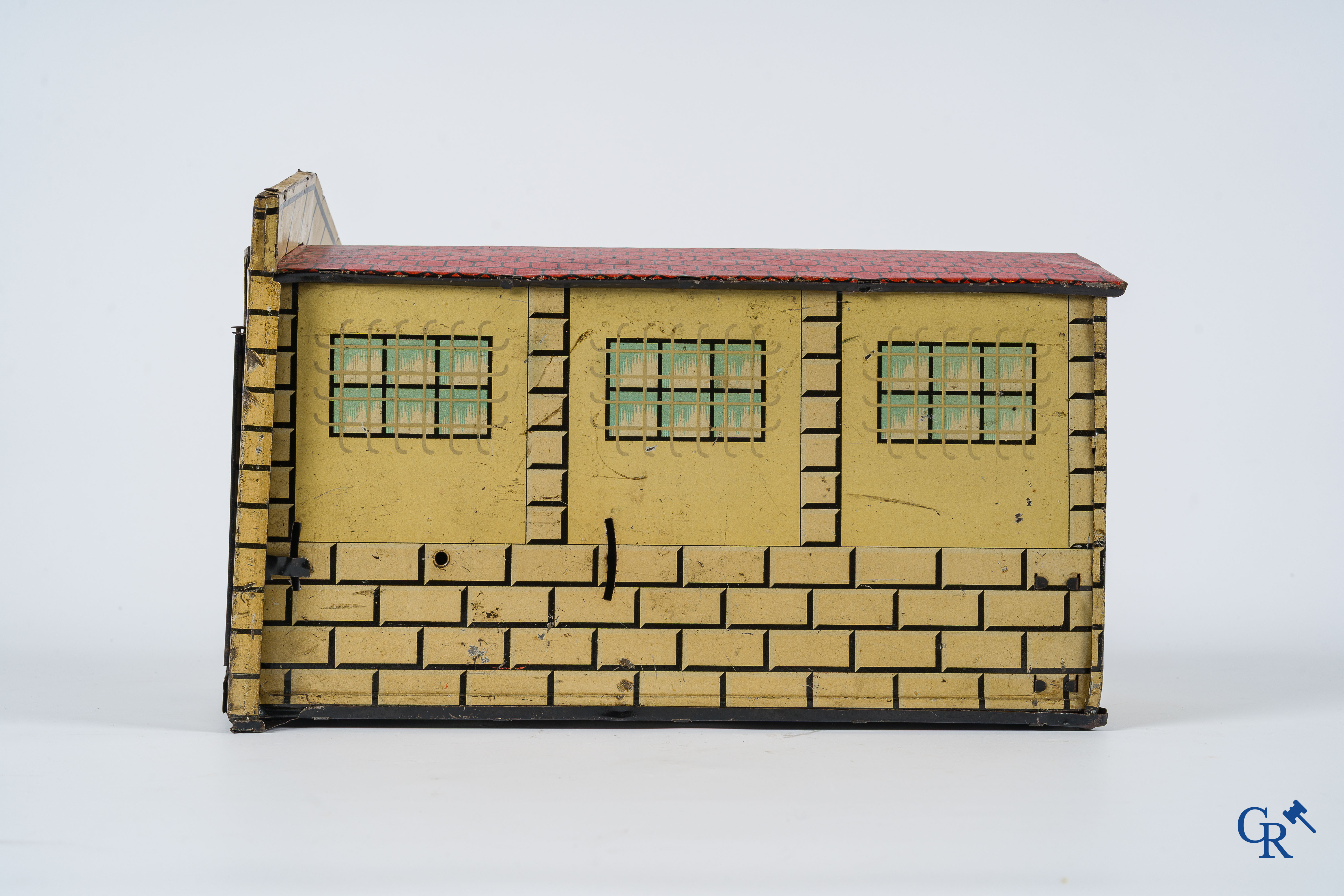 Old toys. Distler, Germany. Limousine with accompanying garage. Metal with winding mechanism. 1920's- 1930's.