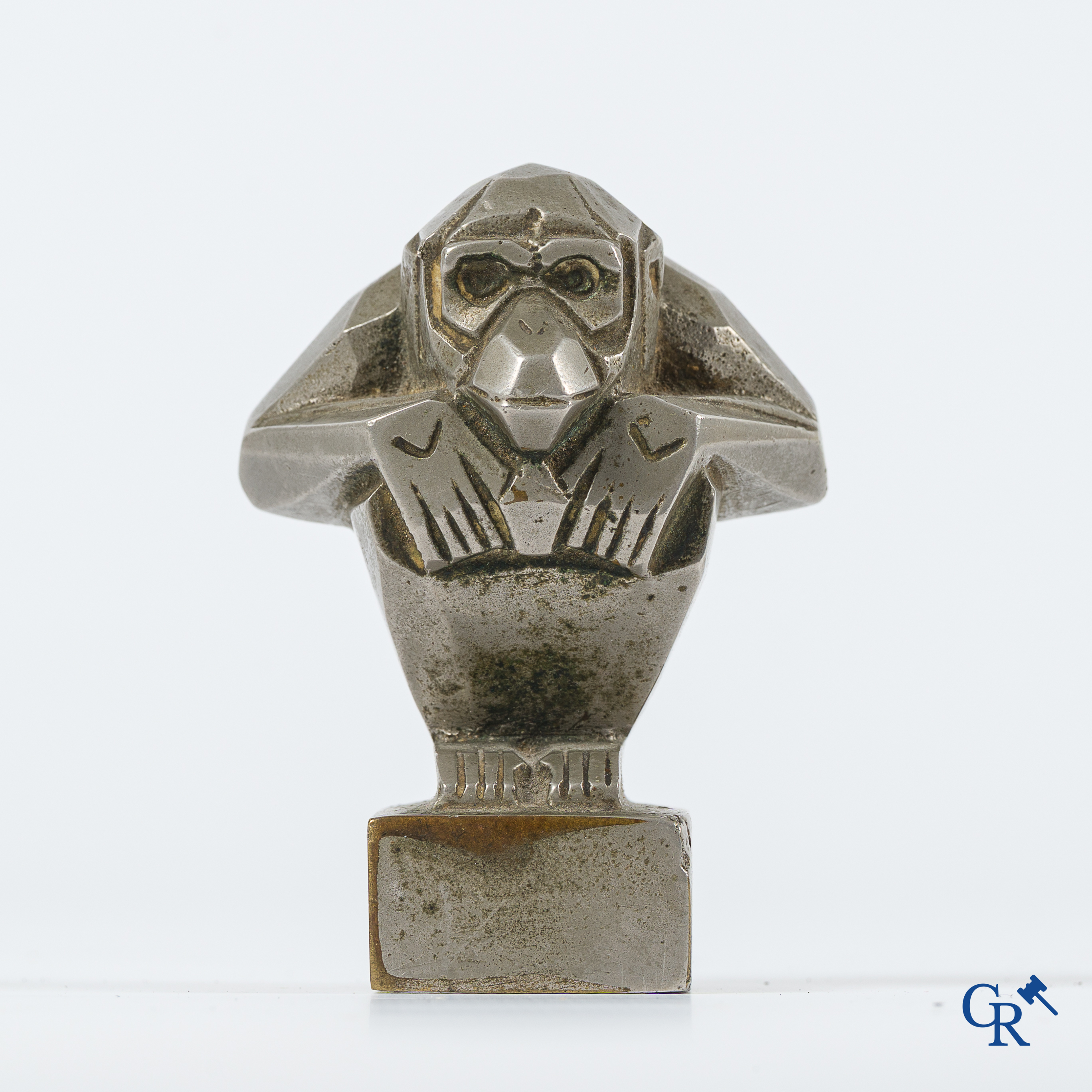 Automobilia. Original Art Deco stylised "Monkey" car mascot in silver-plated bronze. Design by Casimir Brau. 1920's.
