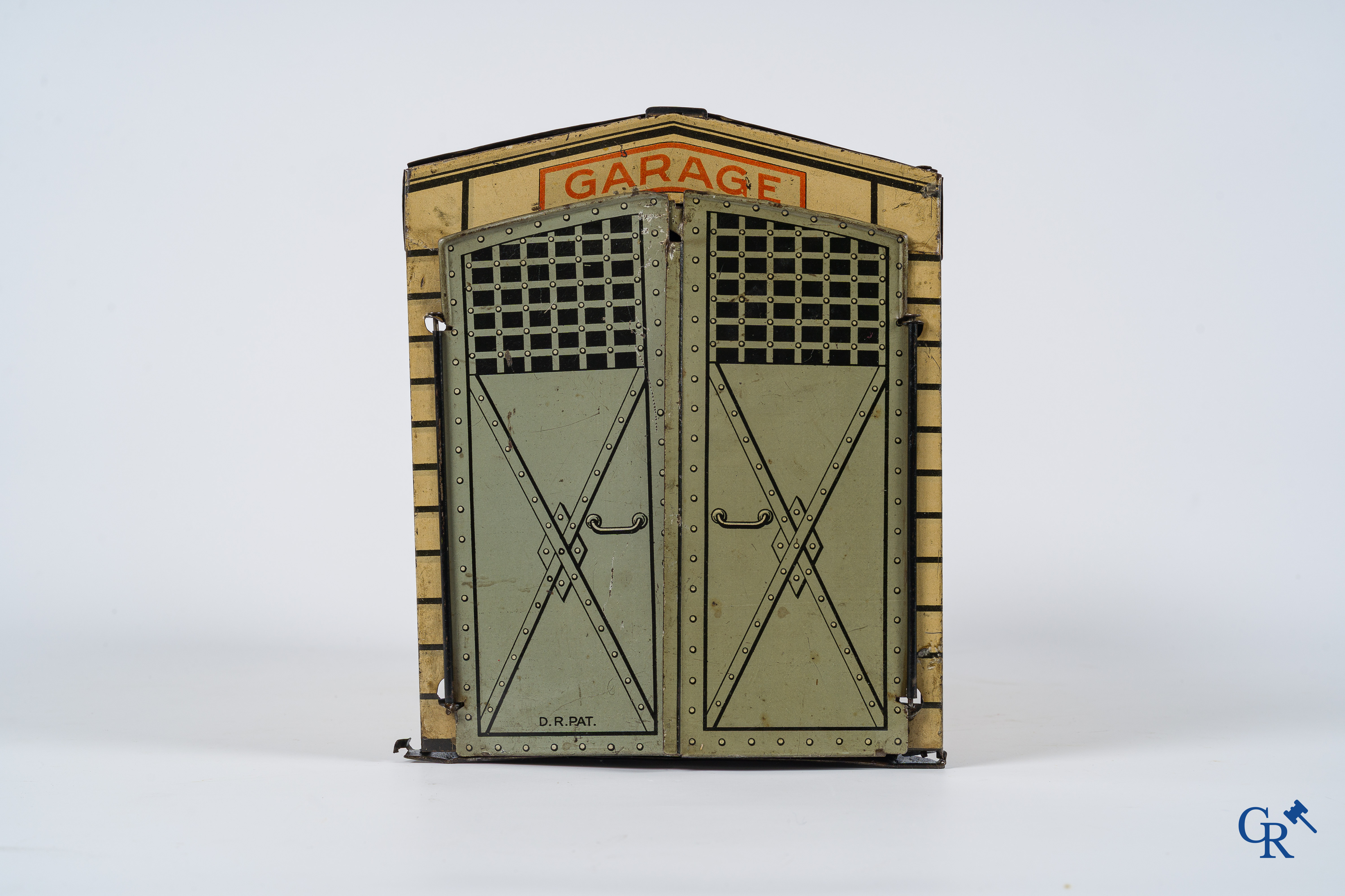 Old toys. Distler, Germany. Limousine with accompanying garage. Metal with winding mechanism. 1920's- 1930's.