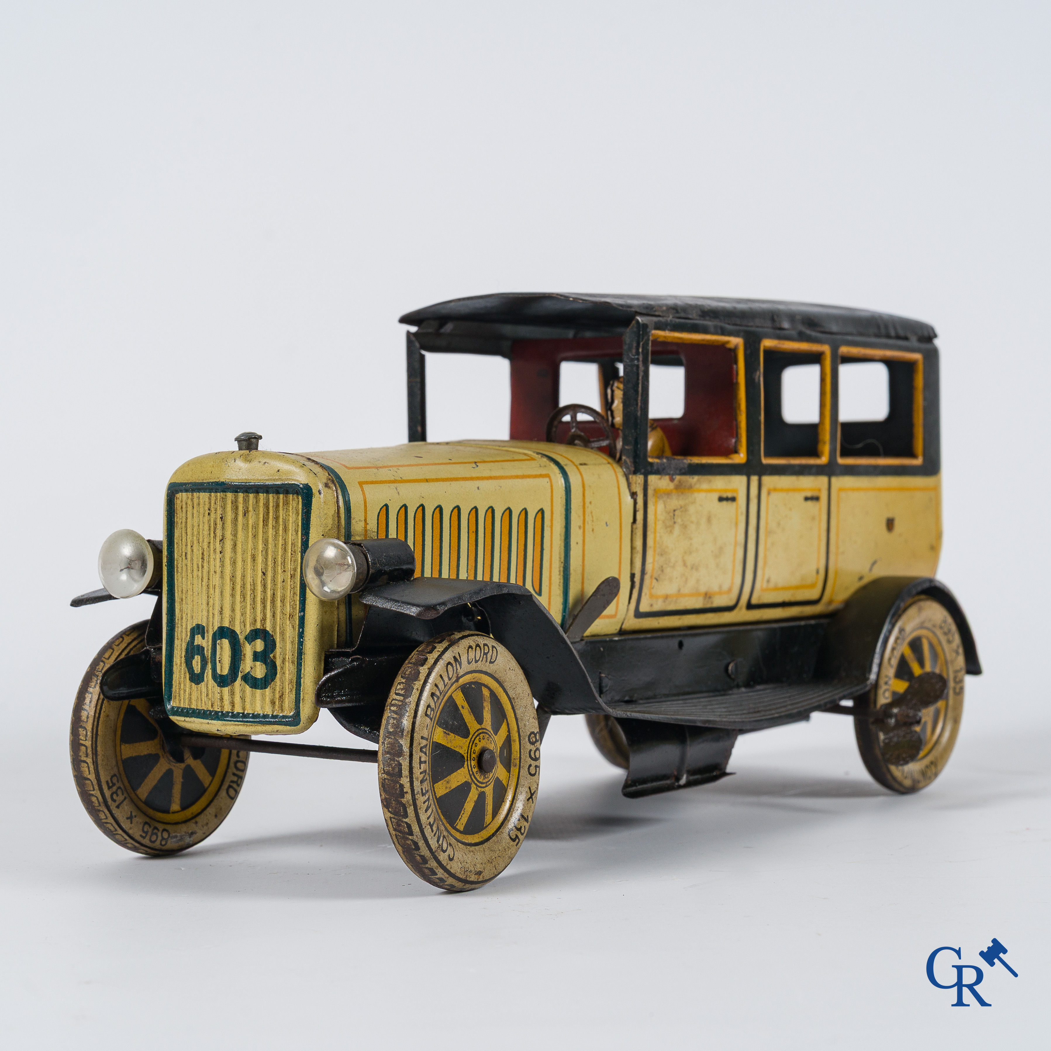 Old toys. Distler, Germany. Limousine with accompanying garage. Metal with winding mechanism. 1920's- 1930's.