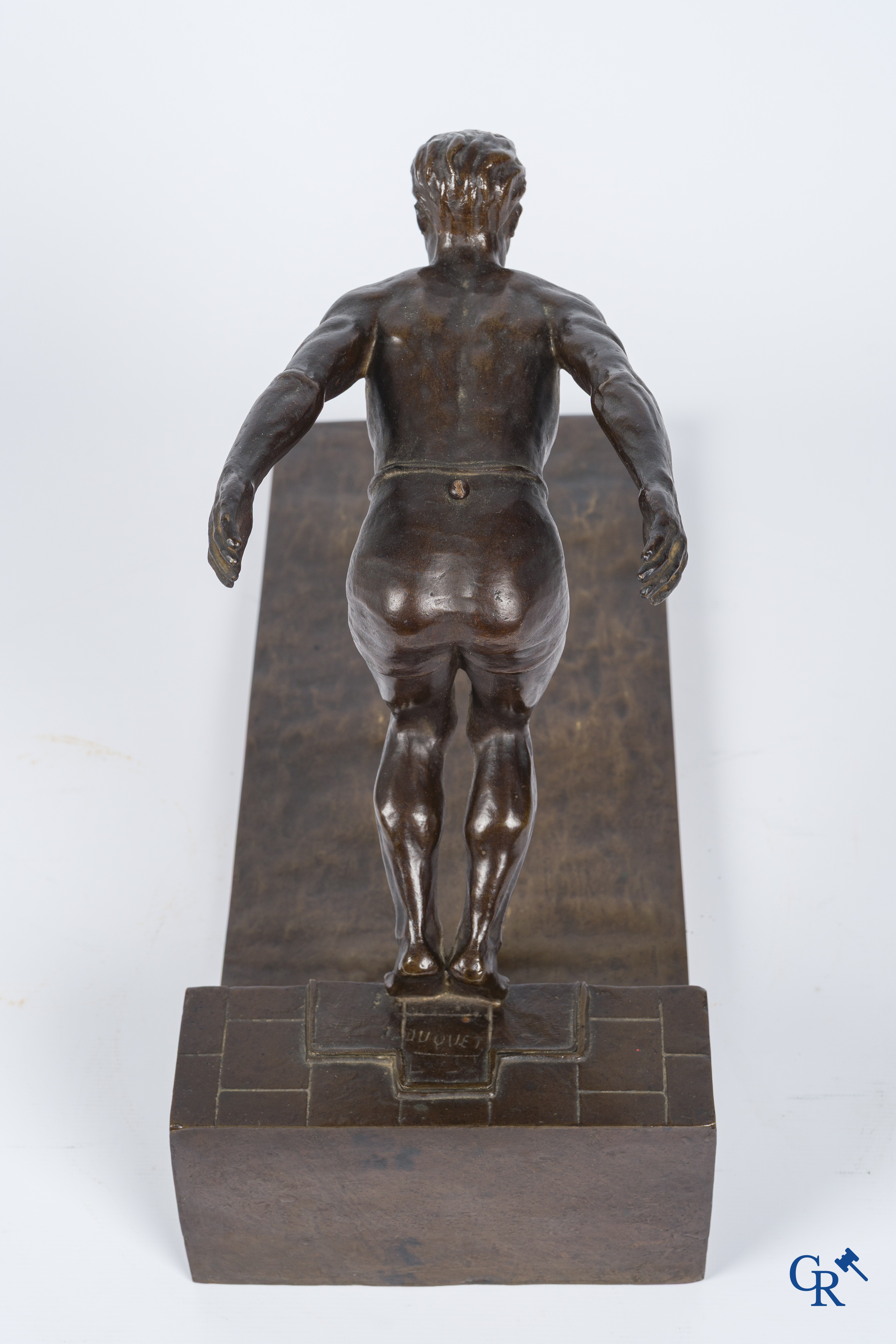J. Duquet. Art Deco. Bronze statue of a swimmer "The dive" Brown patina. Signed. Circa 1930.