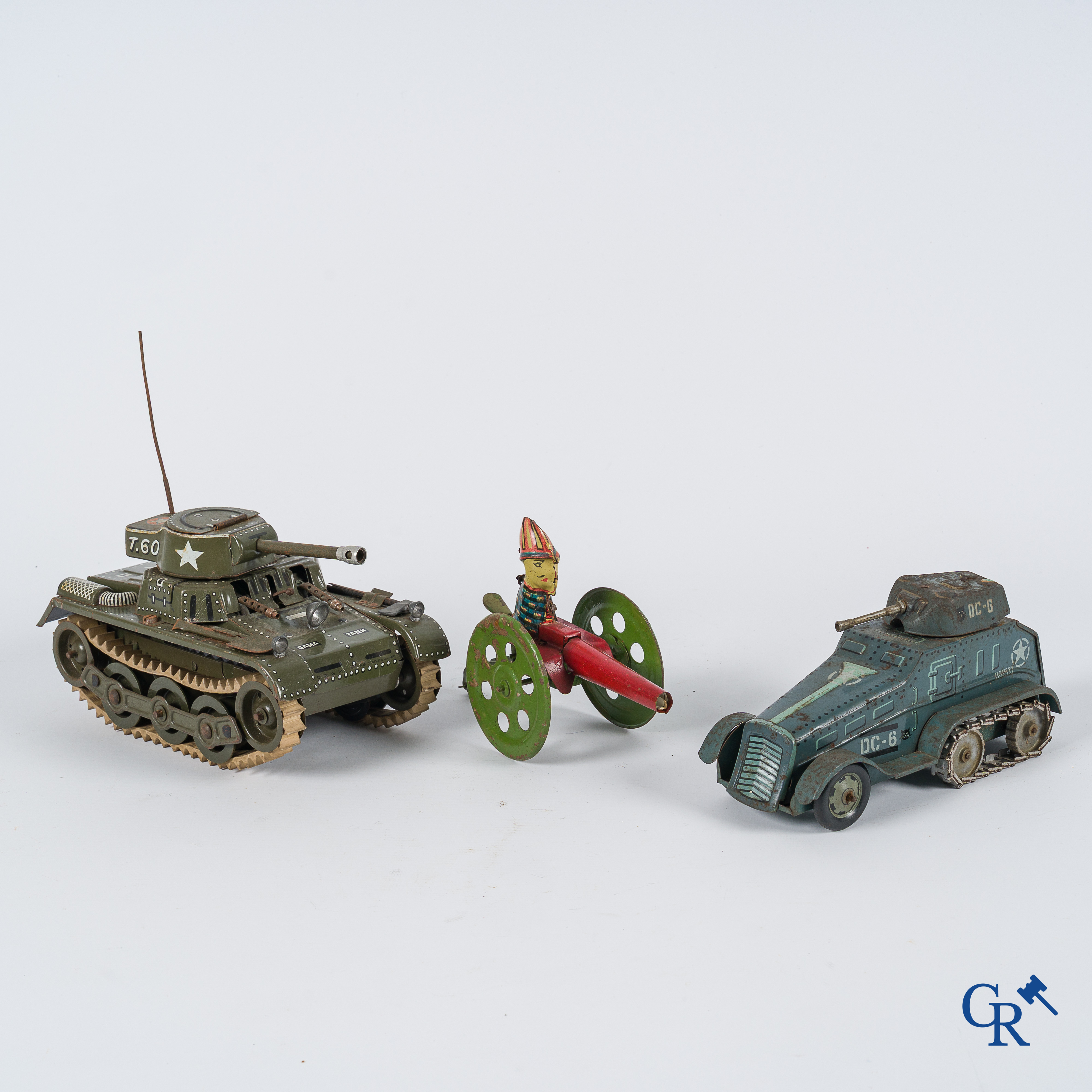 Old toys, Germany, Western Germany. 3 pieces of tin toys, Gama Tank, army vehicle and a cannon.