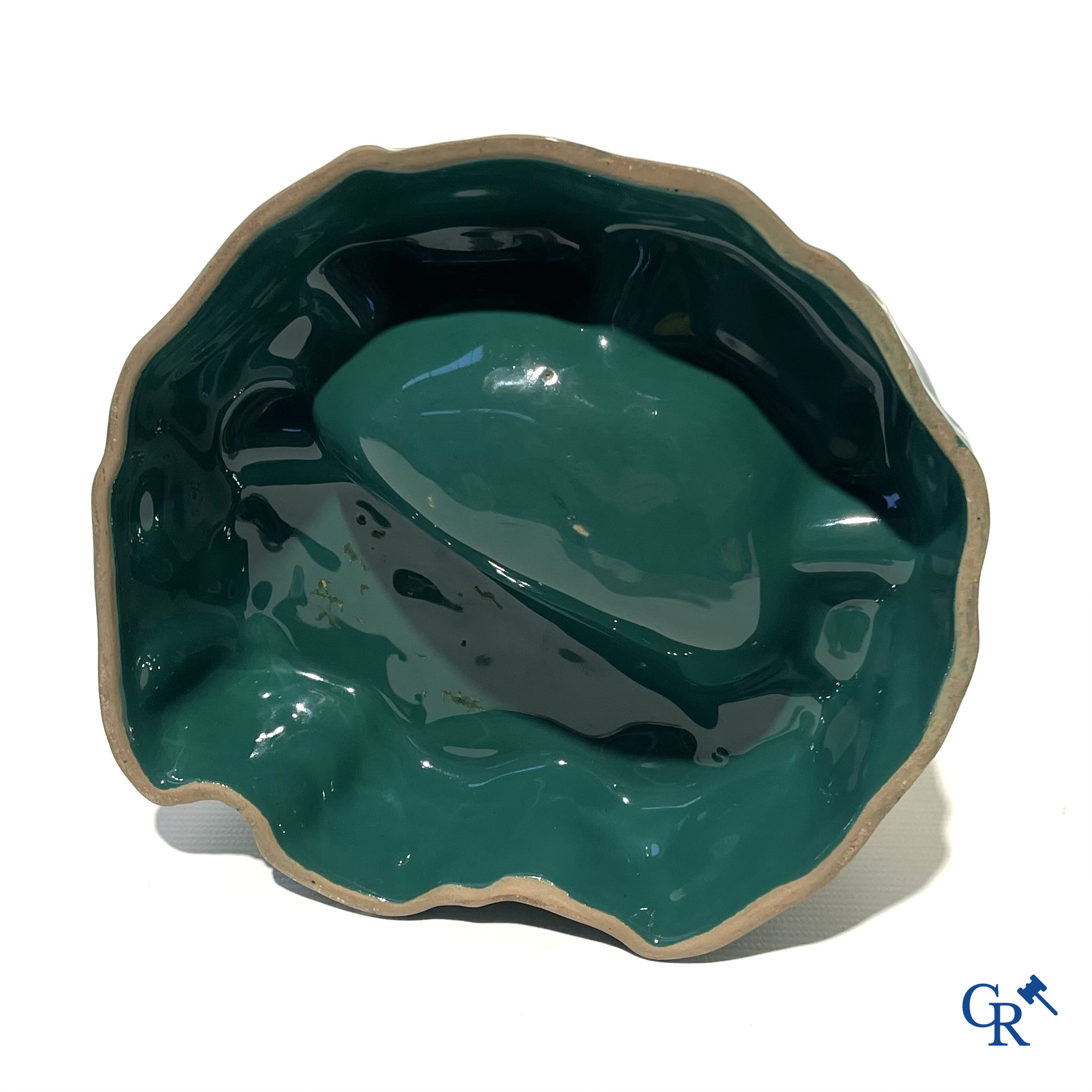 Sinclair. Publicity ashtray with a dinosaur in enamelled faience for the Sinclair Oil Corporation. 1950's.