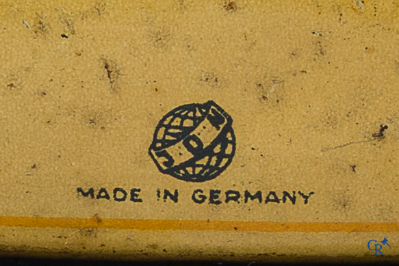 Old toys. Distler, Germany. Limousine with accompanying garage. Metal with winding mechanism. 1920's- 1930's.