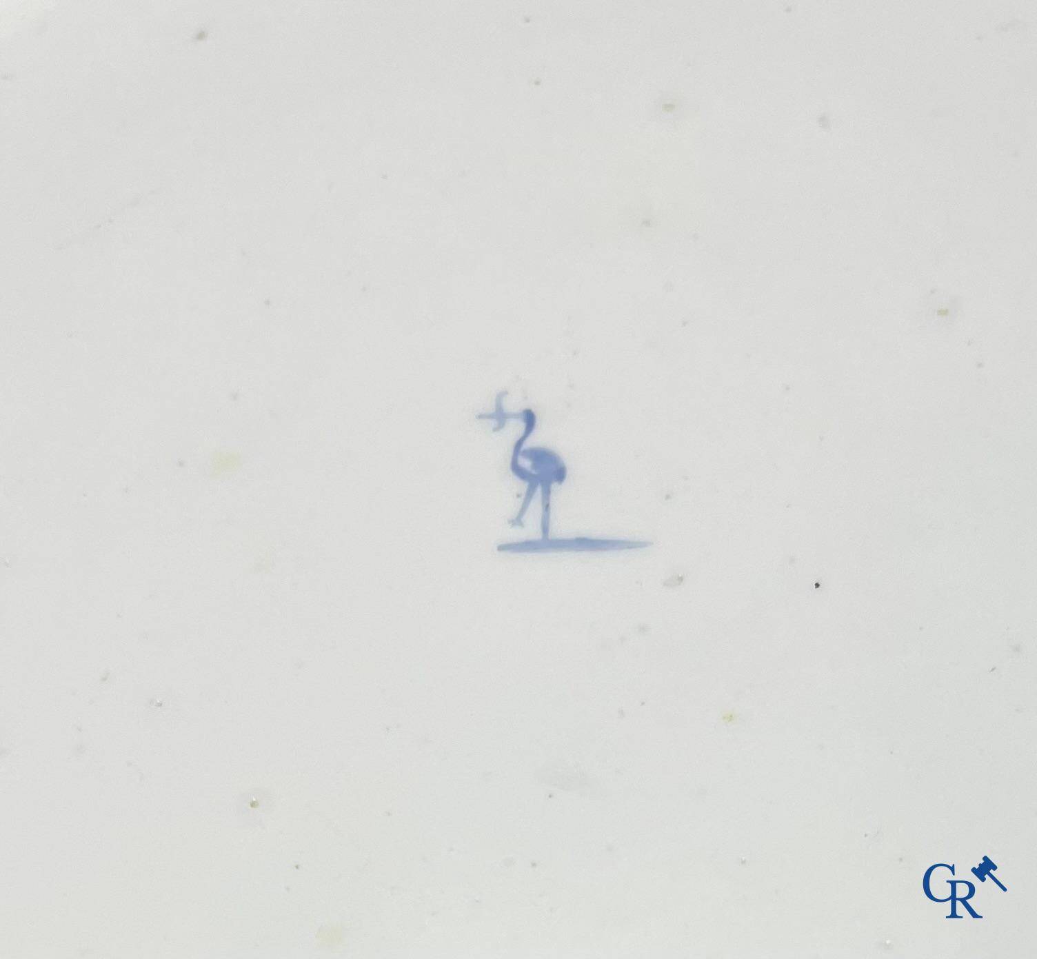 European porcelain, Tournai. 2 plates with a polychrome decoration of birds and gold decoration in The Hague. 18th century.