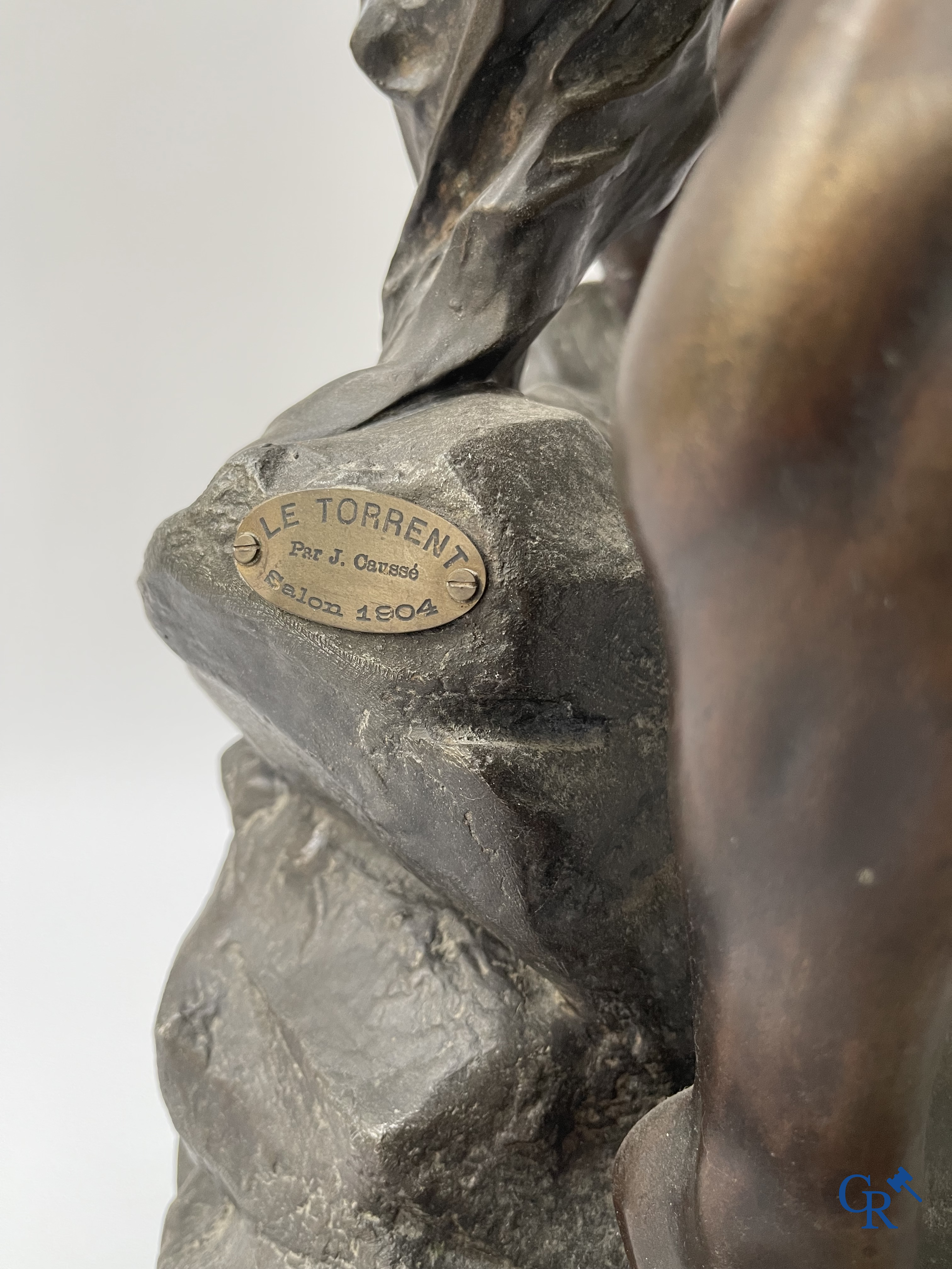 Jules Caussé (1869-1938) "Le Torrent", Salon 1904. Large statue with brown patina in spelter.