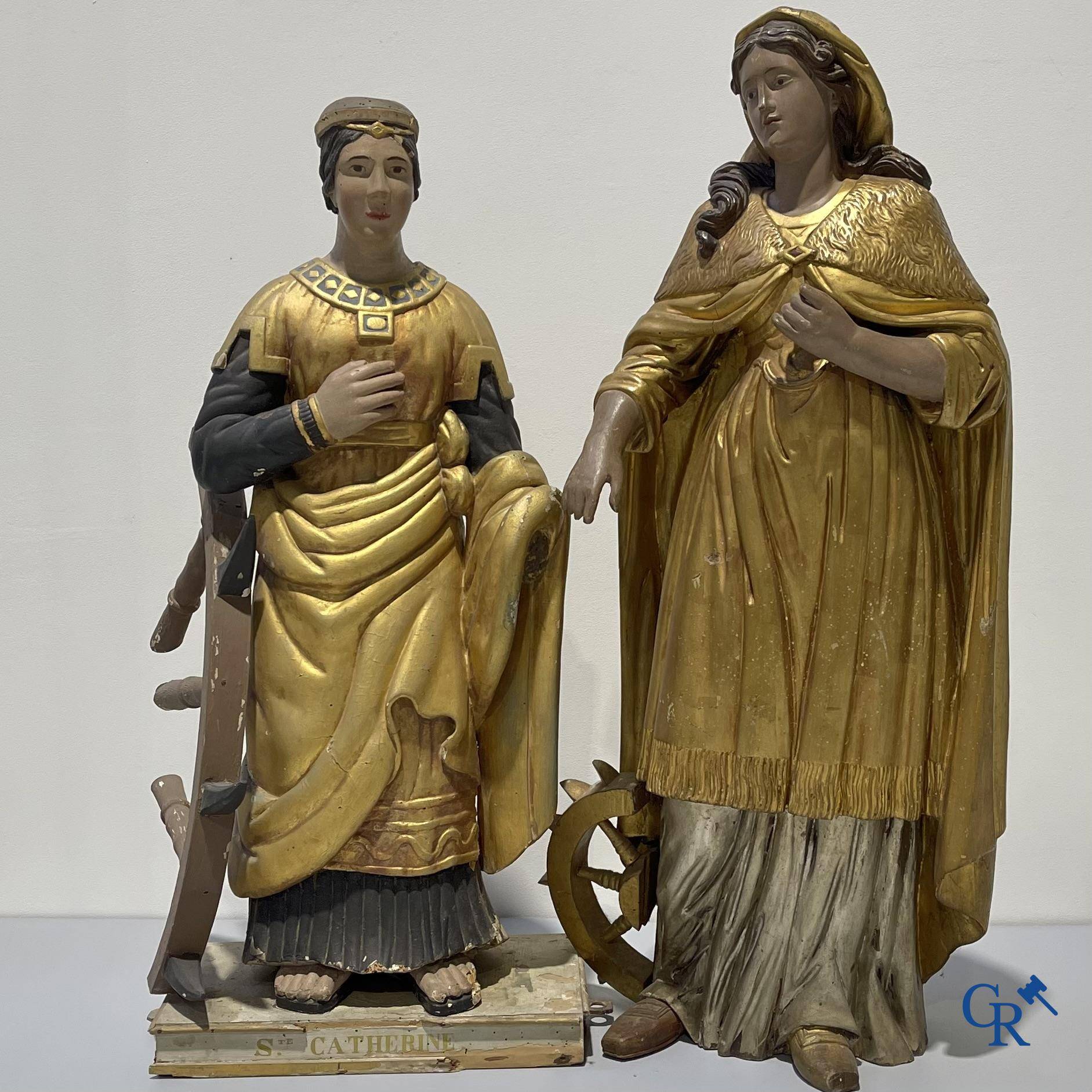 2 statues en bois polychrome représentant Sainte Catherine d'Alexandrie. Fin XVIIIème - début XIXème siècle.