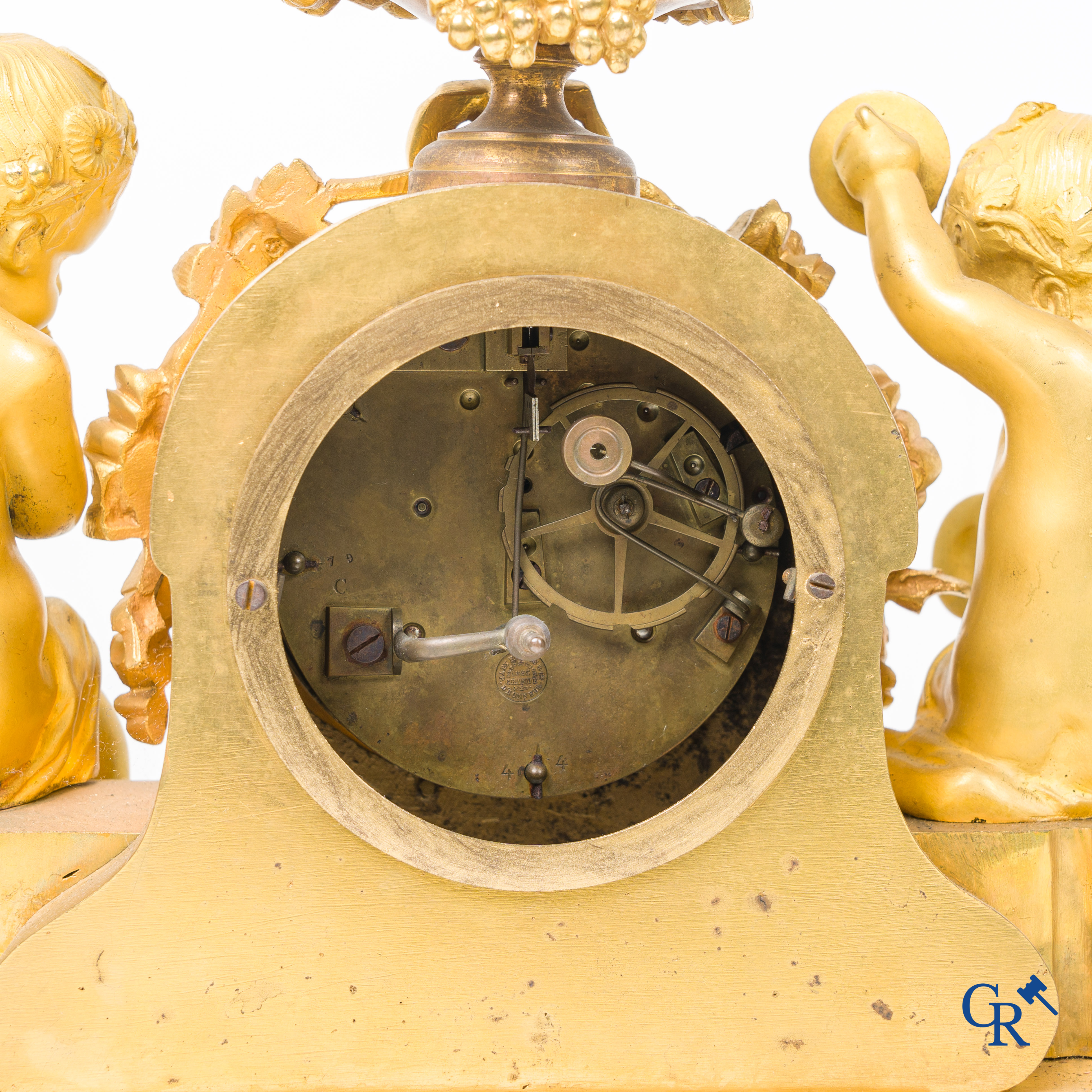 A 3-piece gilded bronze fireplace clockset with Sèvres porcelain.