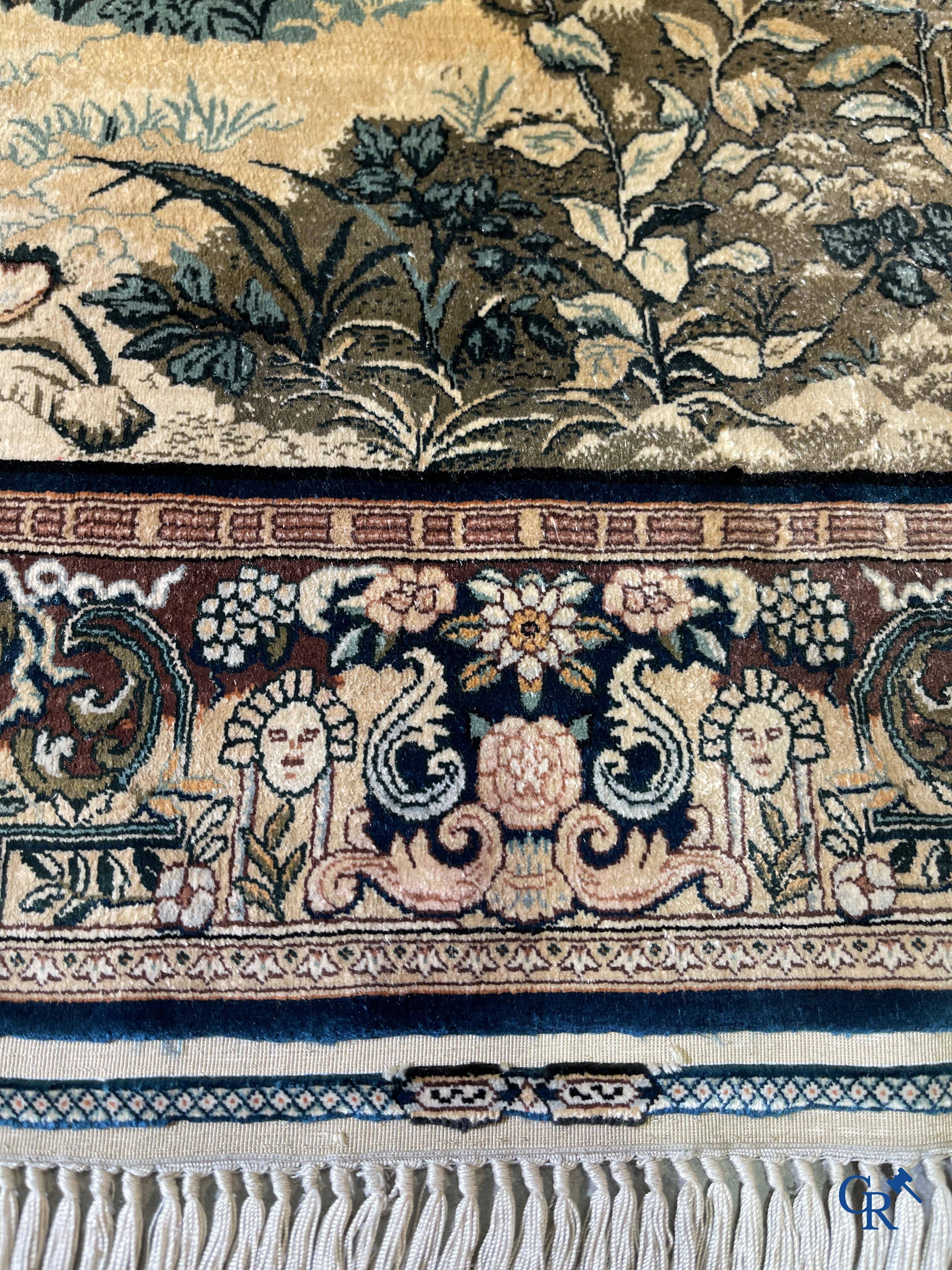 Oriental carpets, a finely knotted silk tapestry with Renaissance scenes. Signed.