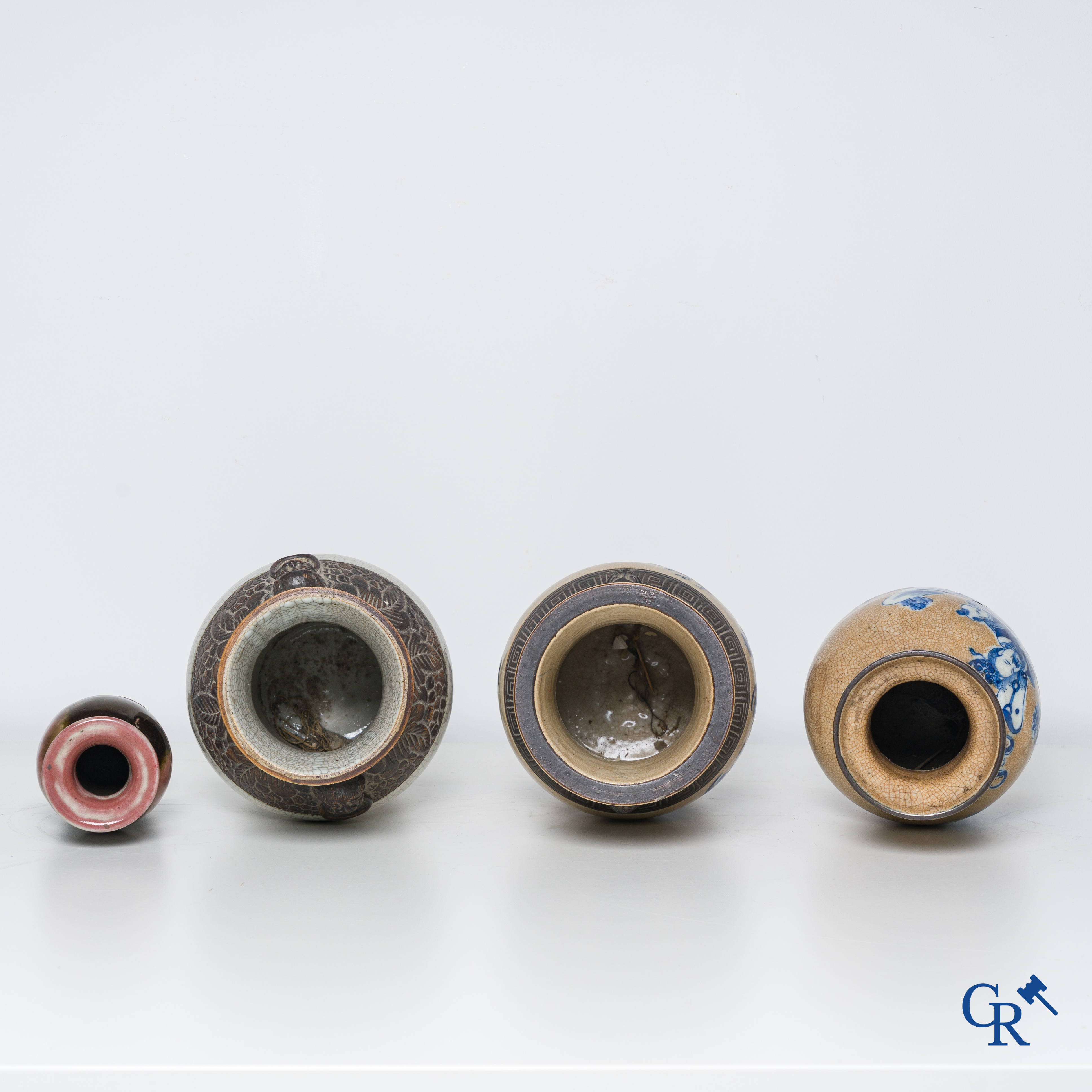 Asian Art, Chinese porcelain, 3 Chinese nanking vases, a red copper decorated vase attached.