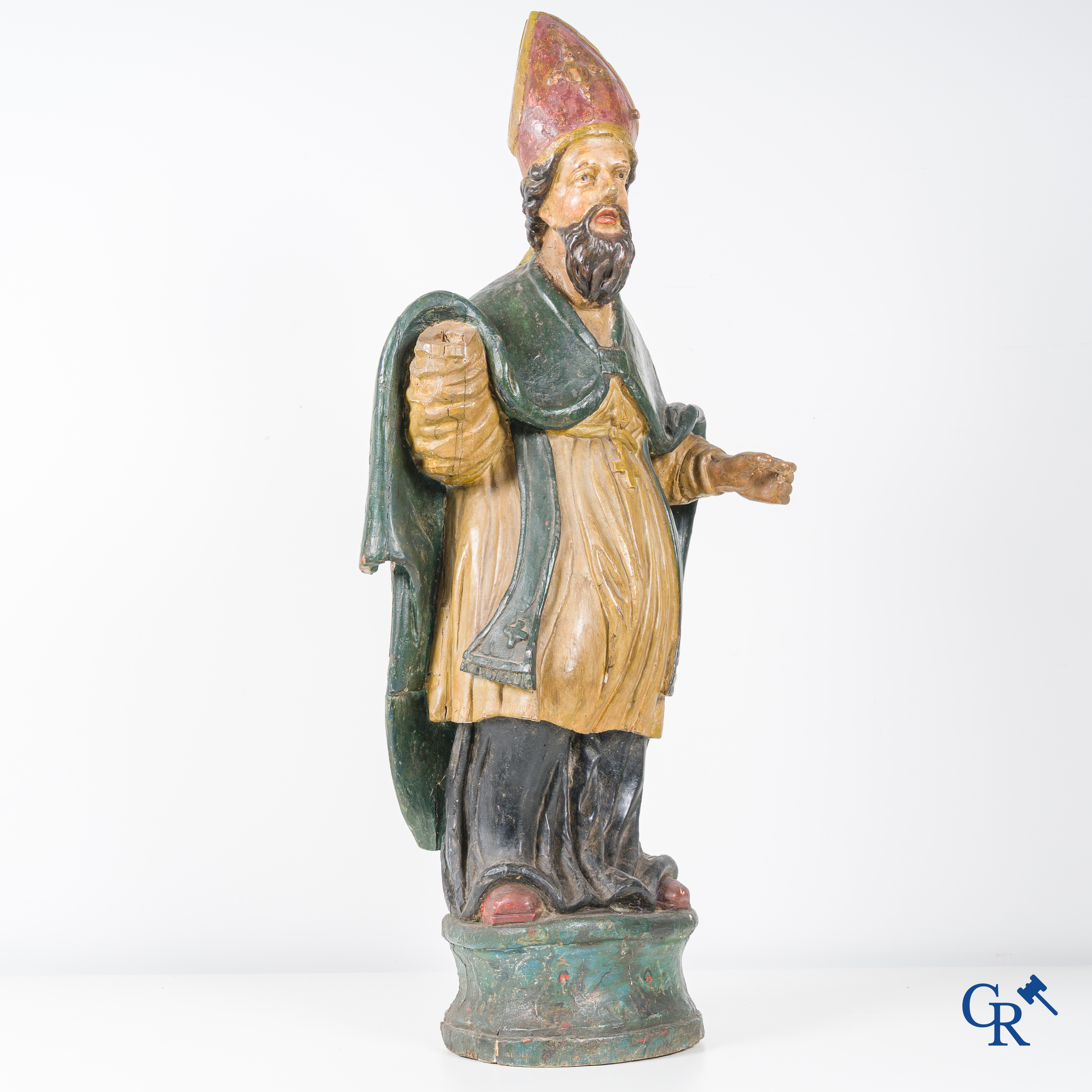 Religious objects, A wooden polychrome staute with a hollowed-out back. 18th century.