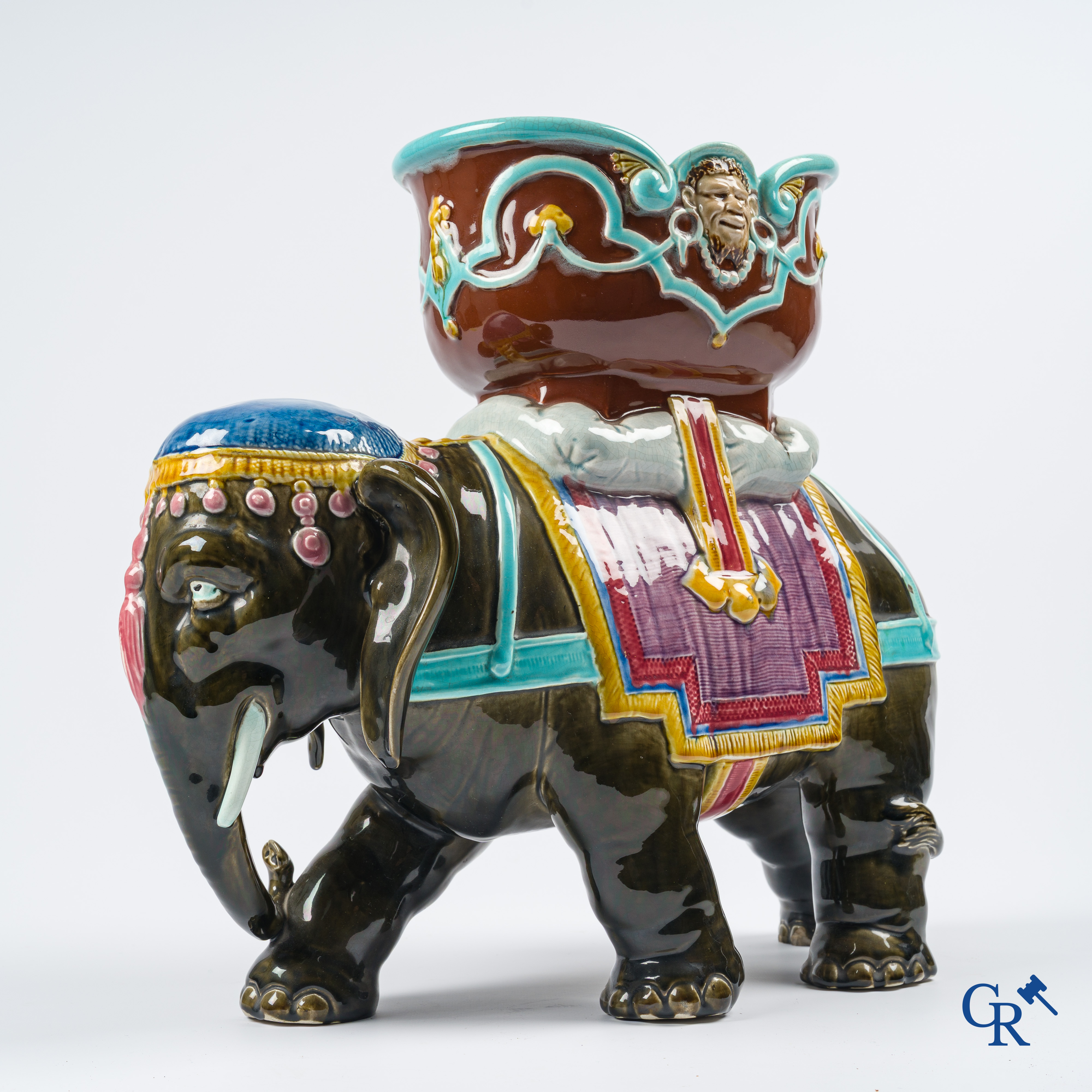 Orchies. A large elephant in multicolored decorated pottery, barbotine. France, circa 1900.