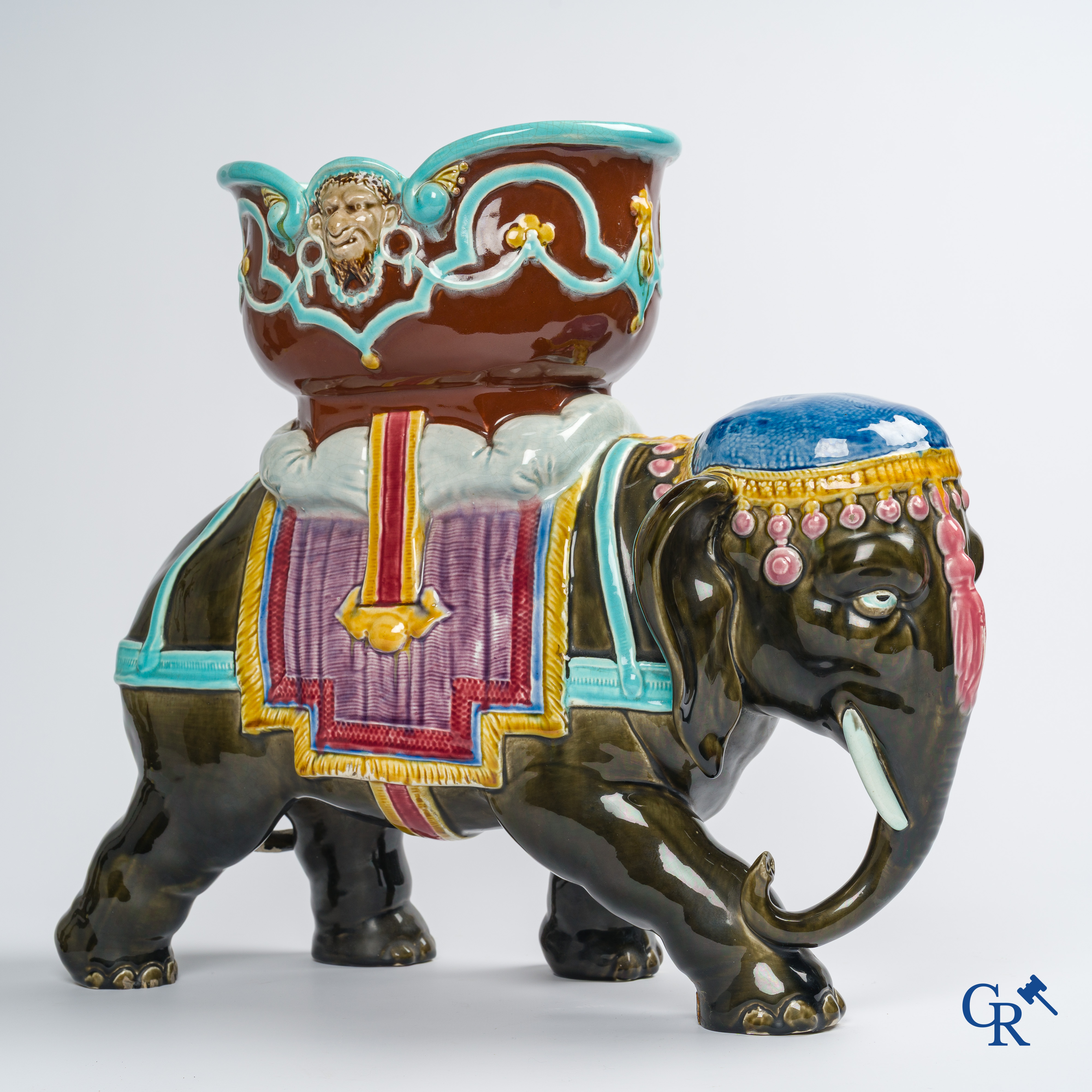 Orchies. A large elephant in multicolored decorated pottery, barbotine. France, circa 1900.