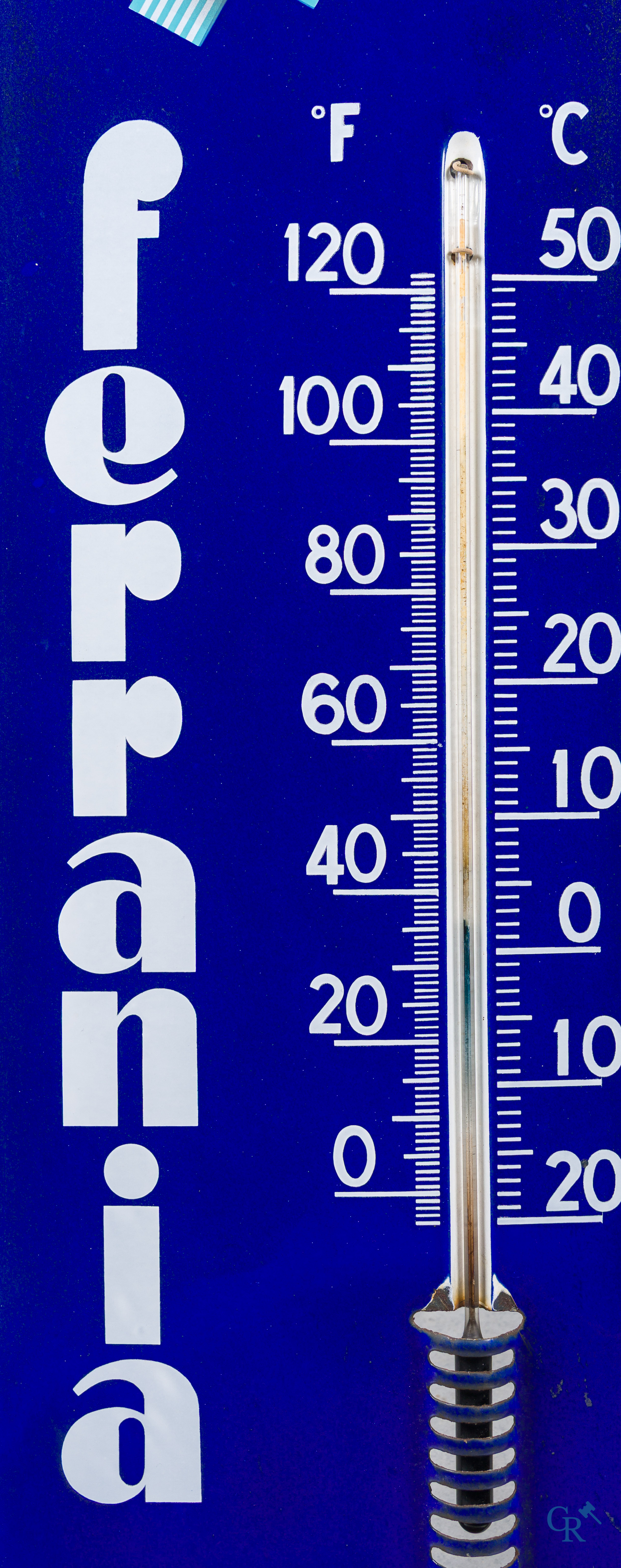Ferrania. Large enamel advertising sign with integrated thermometer for photographic products.