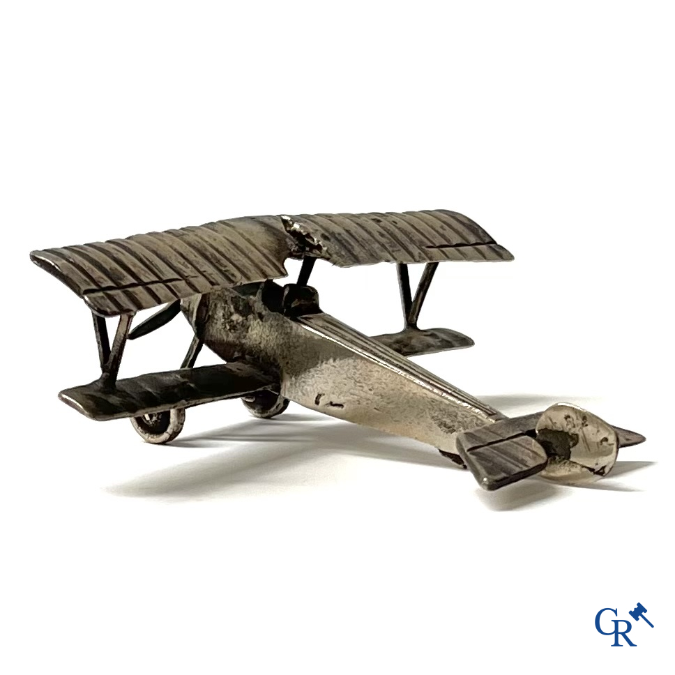 A miniature model of a double-decker aircraft in silver 800°/00. Circa 1930.