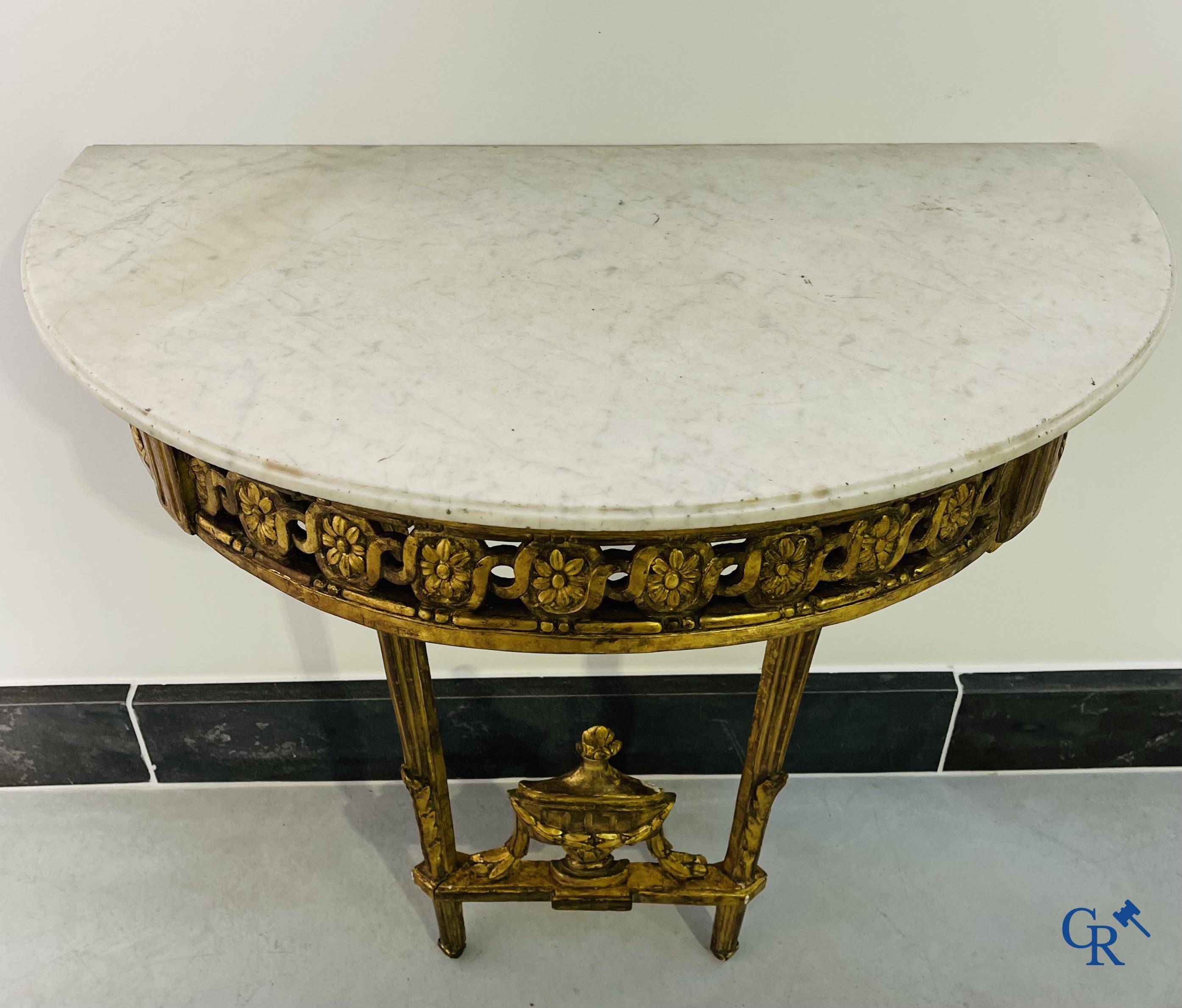 Furniture: Wood sculpted and gilded crescent shaped console. LXVI-period.