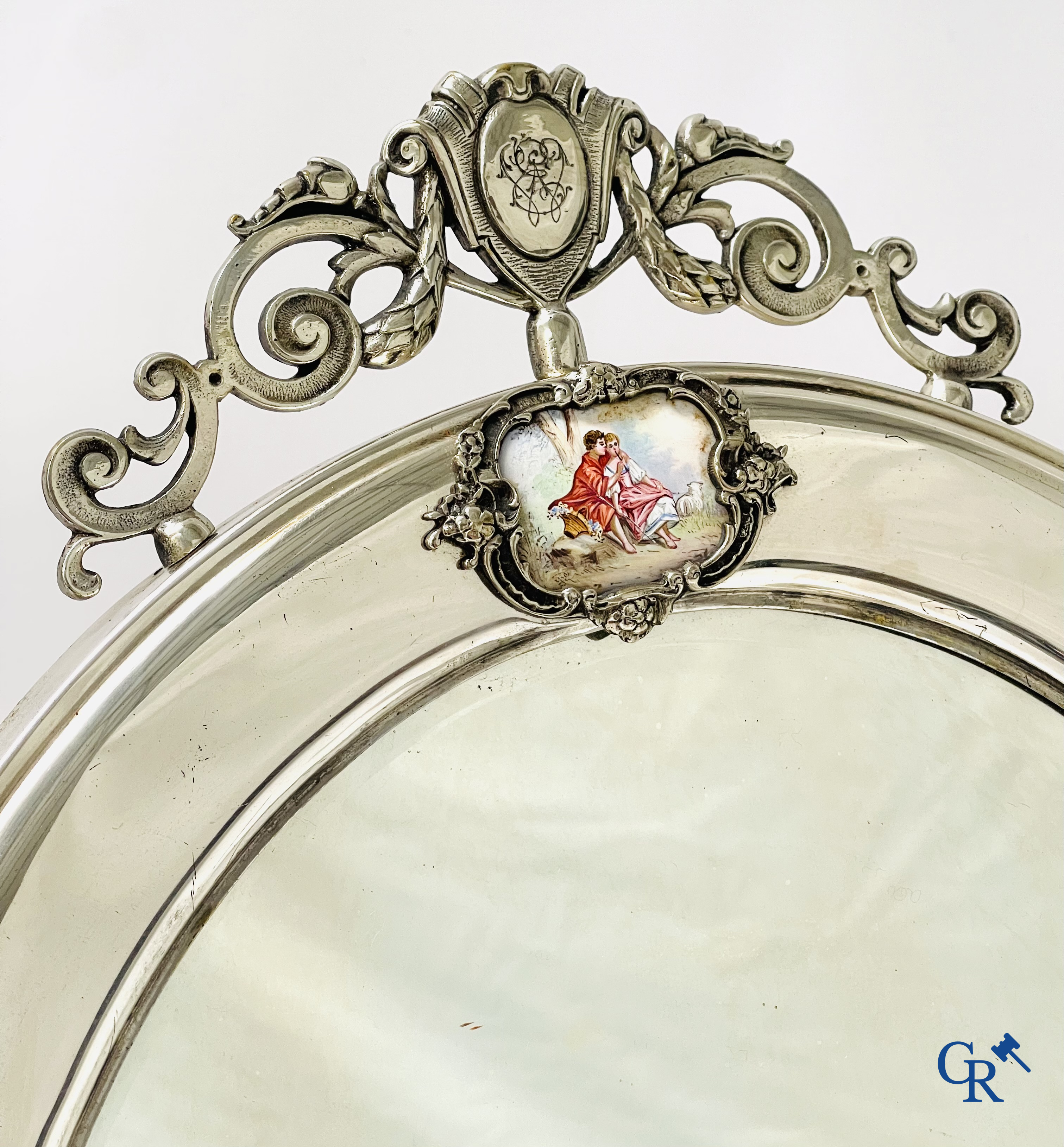 A seven-piece toilet set in silver-plated metal, finely cut crystal and enamelled plaques.