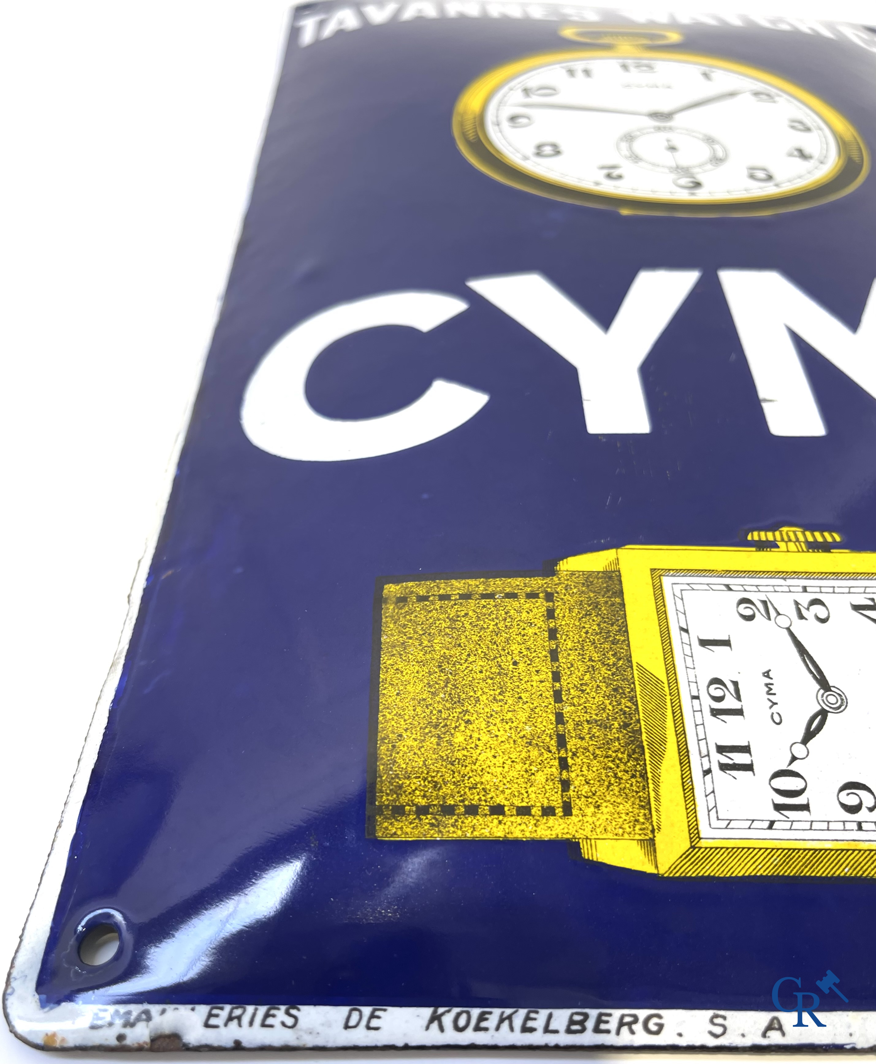 Tavannes Watch Company. Bombed enamel advertising sign for Cyma wrist and pocket watches. 1926.