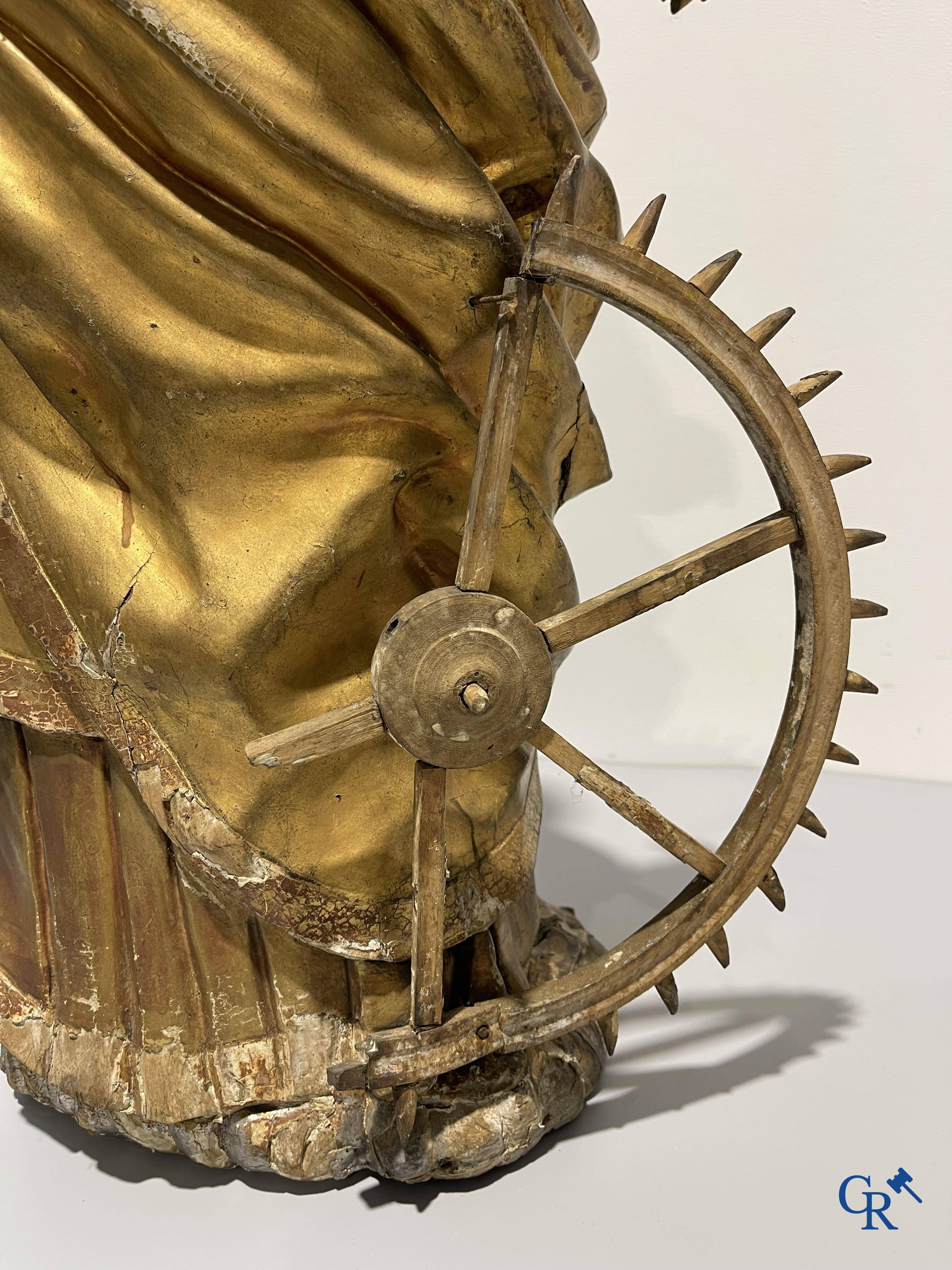 Exceptionally polychrome wooden statue of Saint Catherine of Alexandria with glass eyes, 18th century.