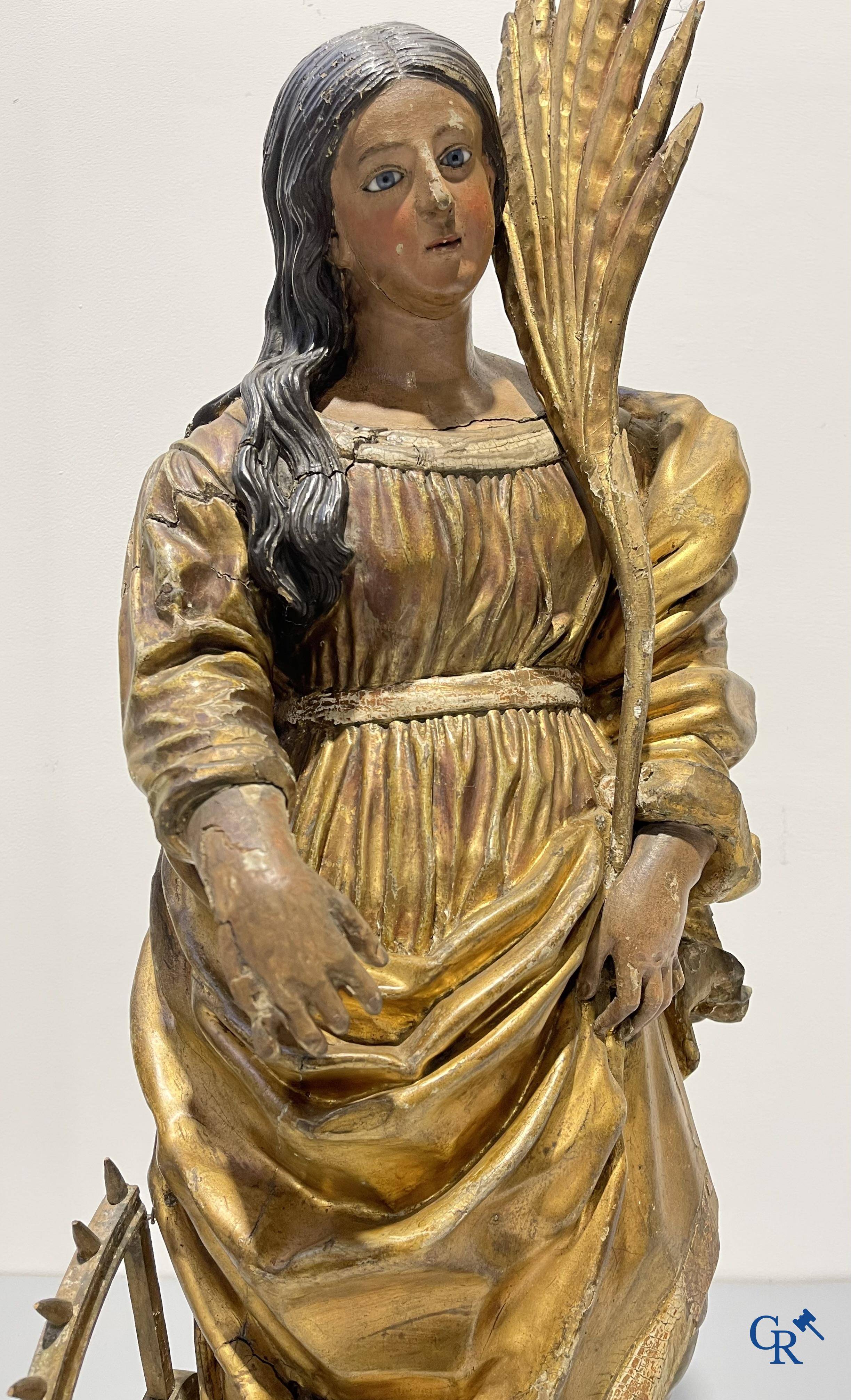 Exceptionally polychrome wooden statue of Saint Catherine of Alexandria with glass eyes, 18th century.