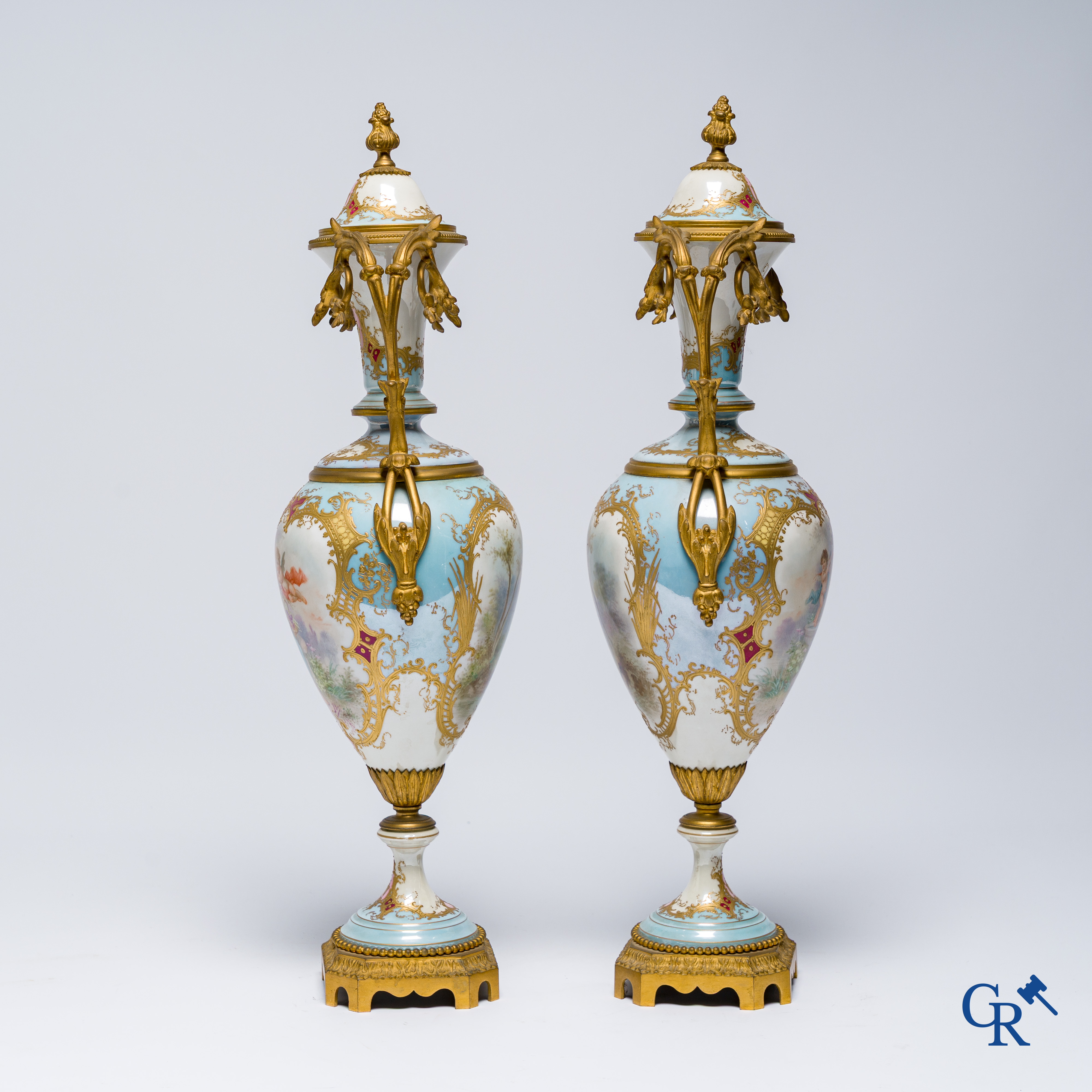 Sèvres, Château des Tuileries, pair of lid vases in light blue porcelain and bronze frame. LXVI style.