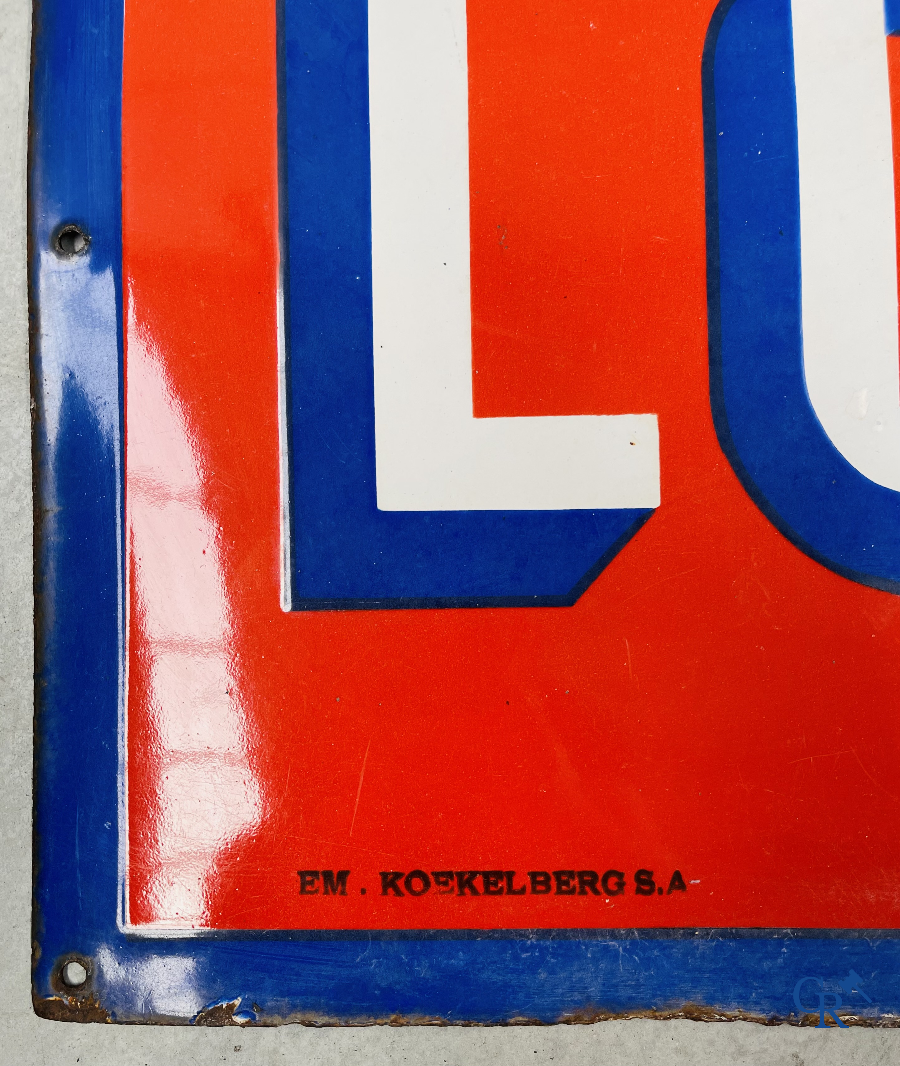 A large enamel advertising sign for Louwaege's beer. Enamel Koekelberg. T.P. Bruxelles 1950.