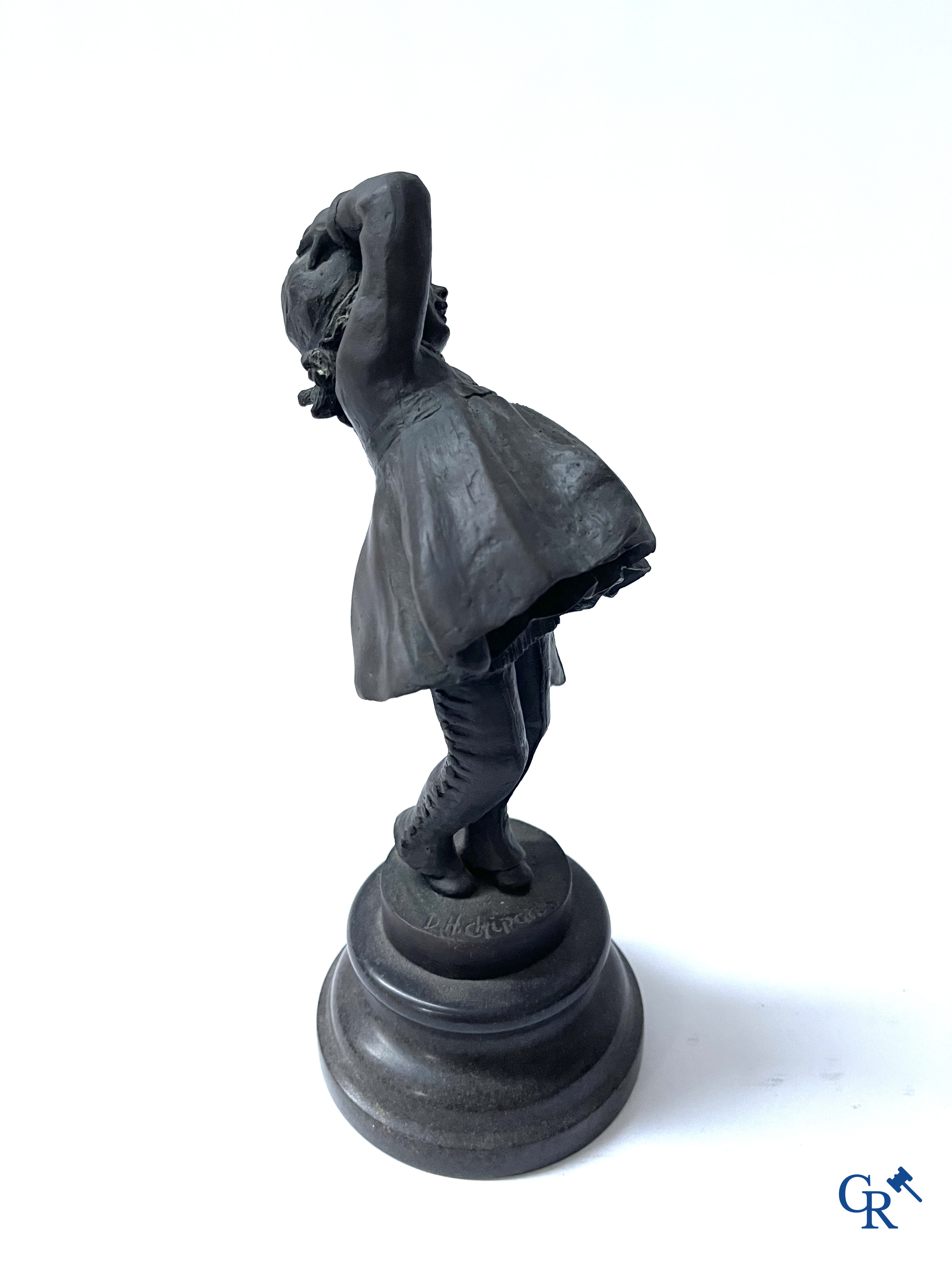 A bronze group after Raoul Larche with 5 children and a basket and 2 bronze statuettes after Chiparus. Posthumous 20th century.