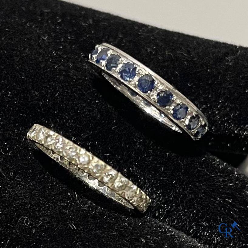 Jewellery, an American wedding ring in white gold 750°/00 and diamonds and a ring in white gold 375°/00 and sapphire.