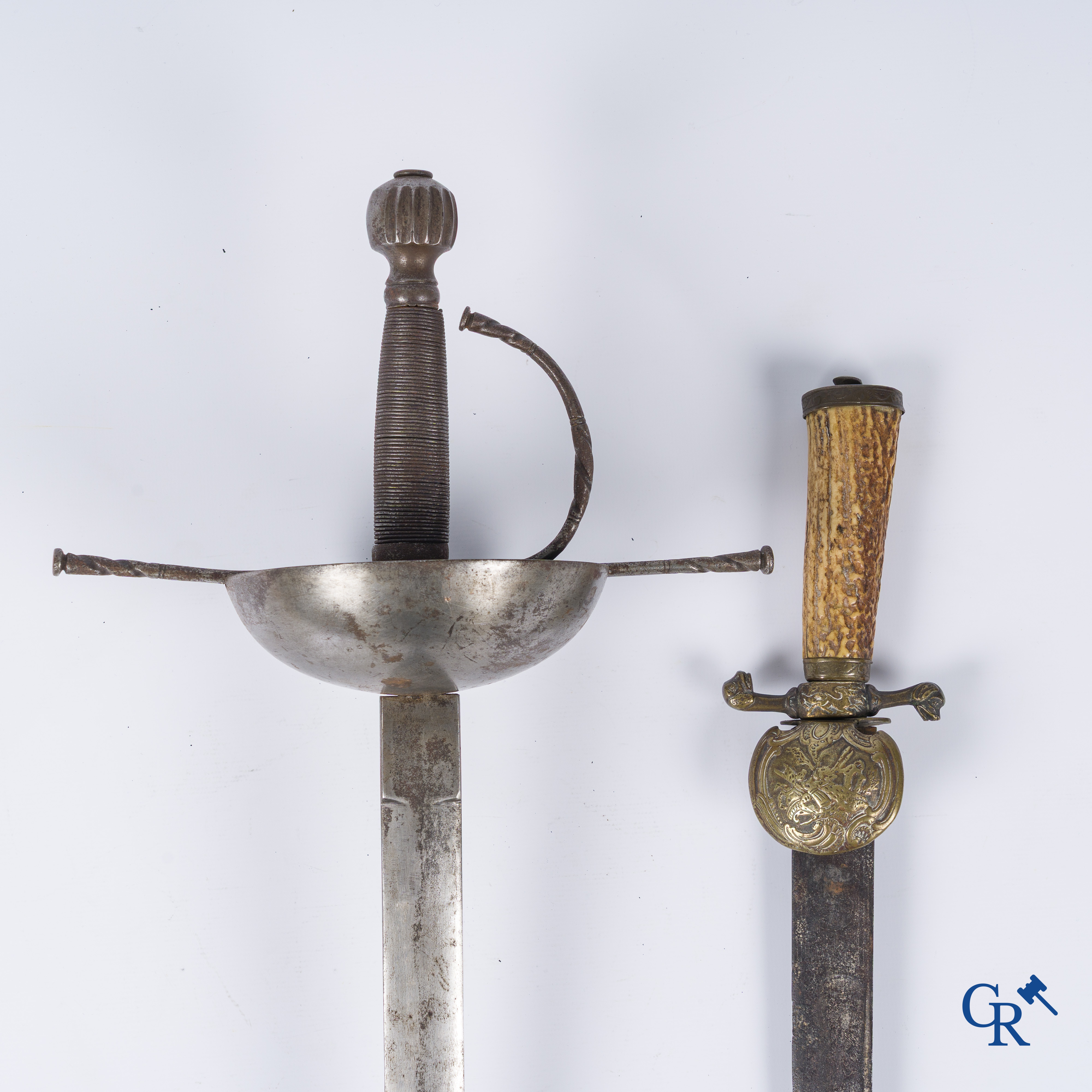 An antique hunting dagger and a sword. 17th-18th century.