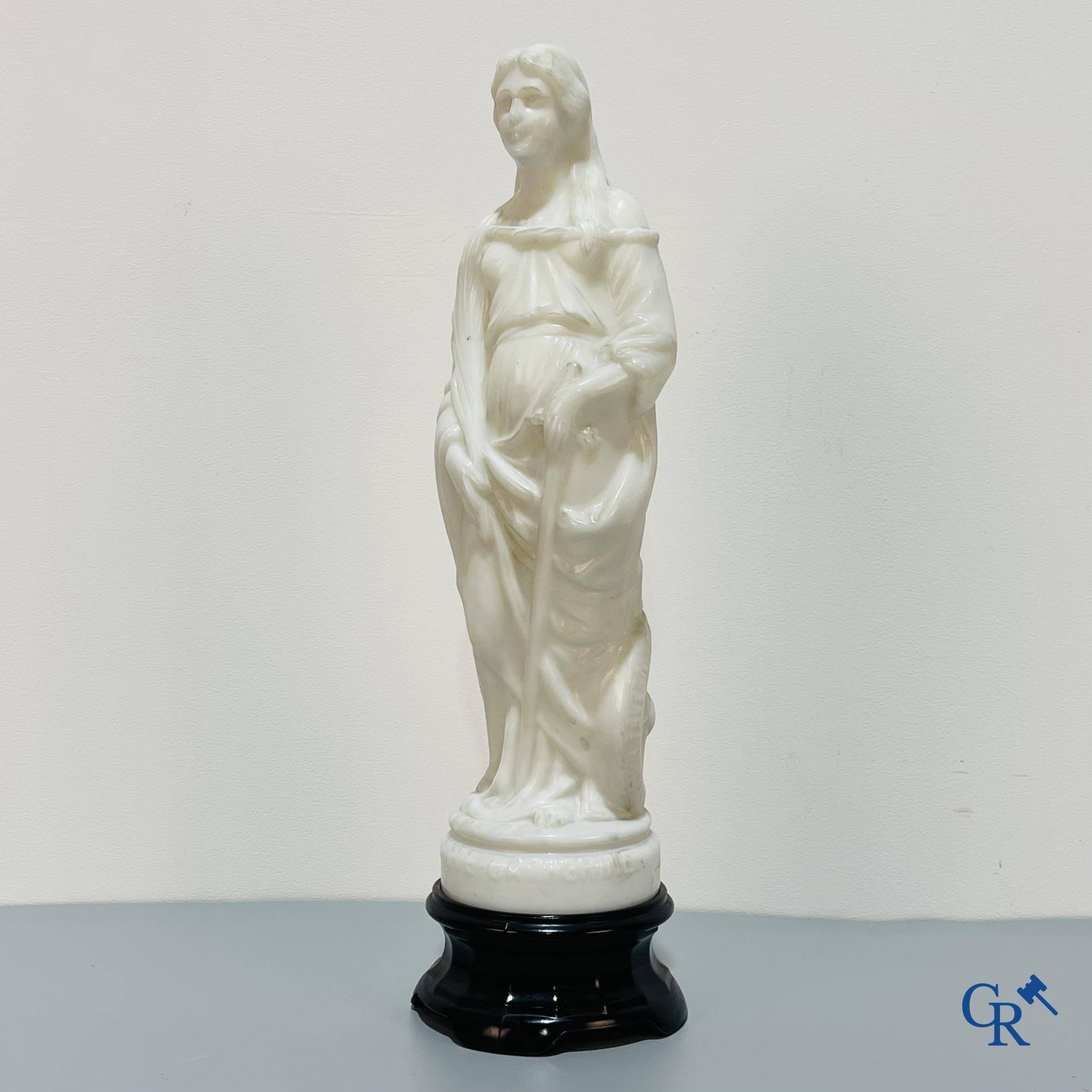 An opaline representation of Saint Catherine on a pedestal. Publicity for Bonbons John Tavernier. Circa 1900.