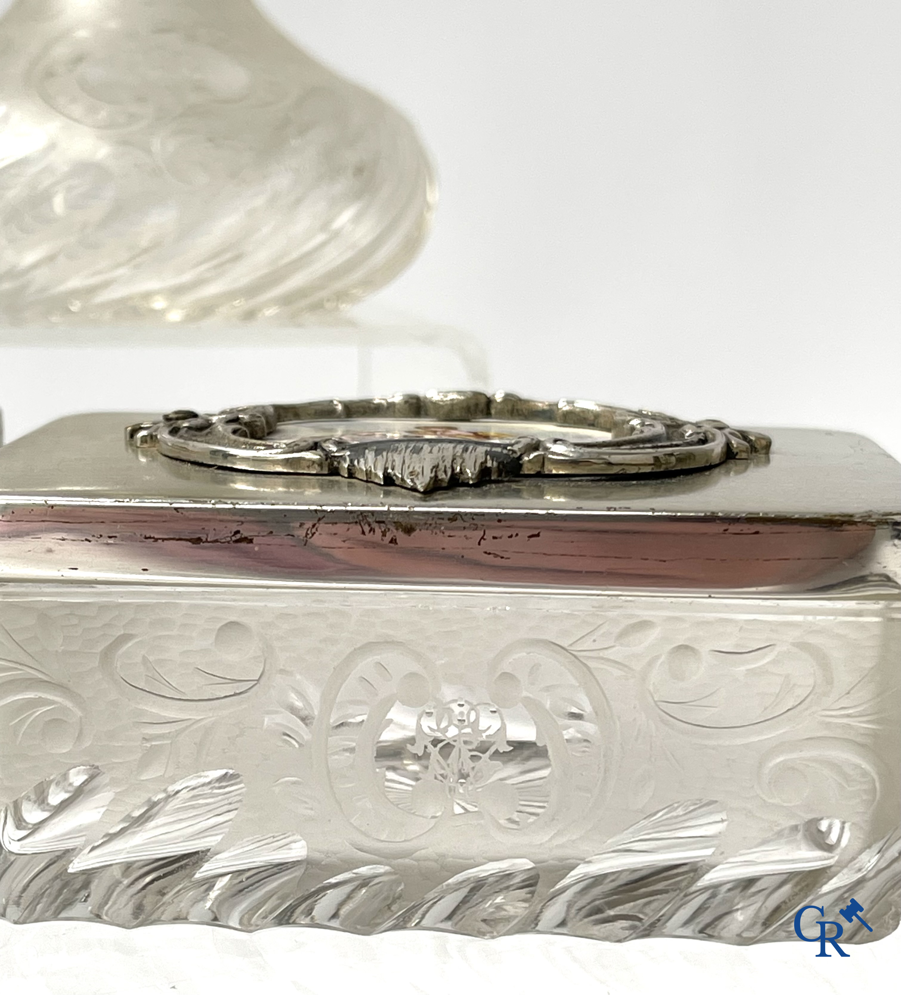 A seven-piece toilet set in silver-plated metal, finely cut crystal and enamelled plaques.