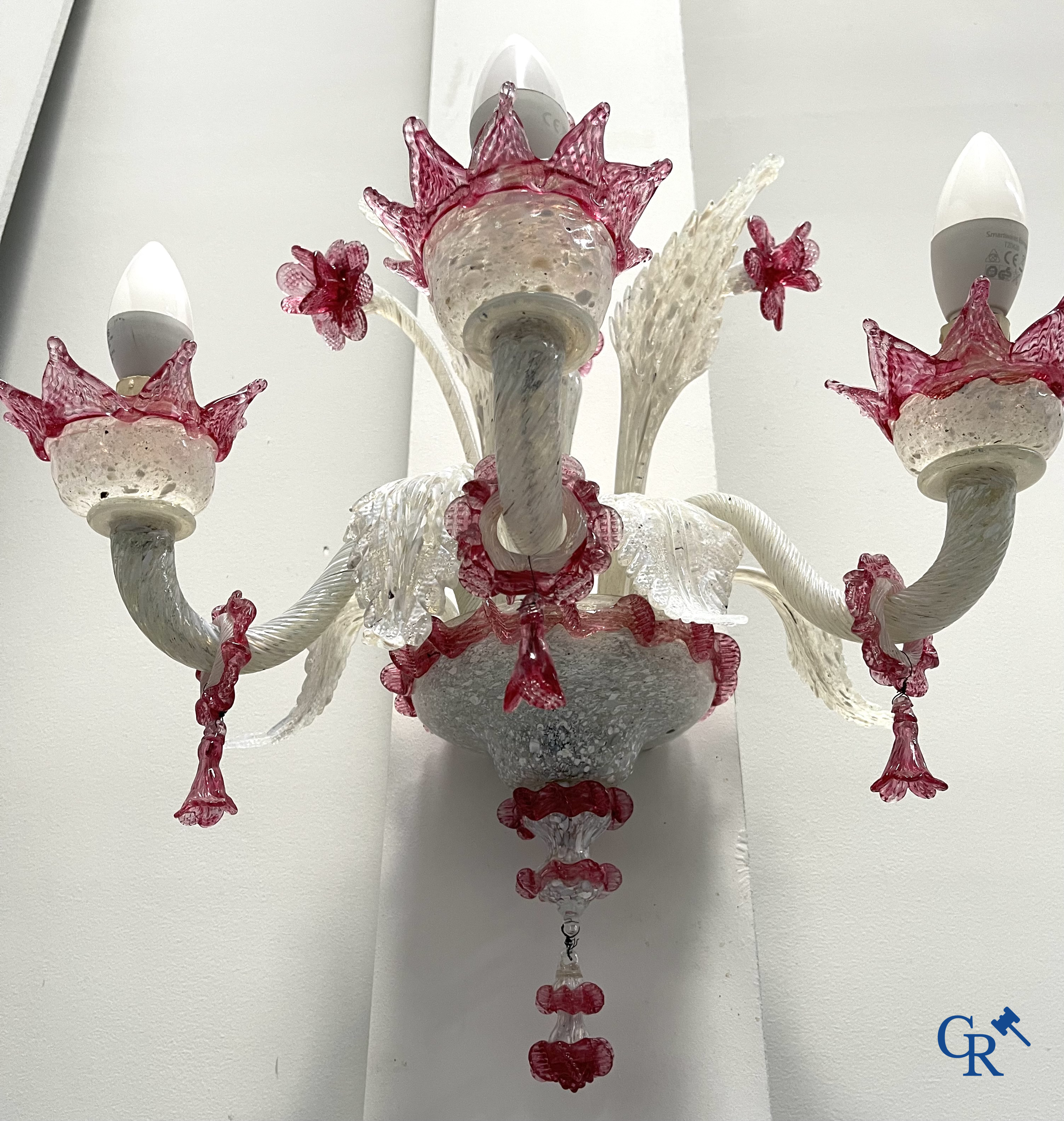 A lot of a Venetian table lamp, a pair of large wall lights in Venetian glass and a Murano ceiling lamp.