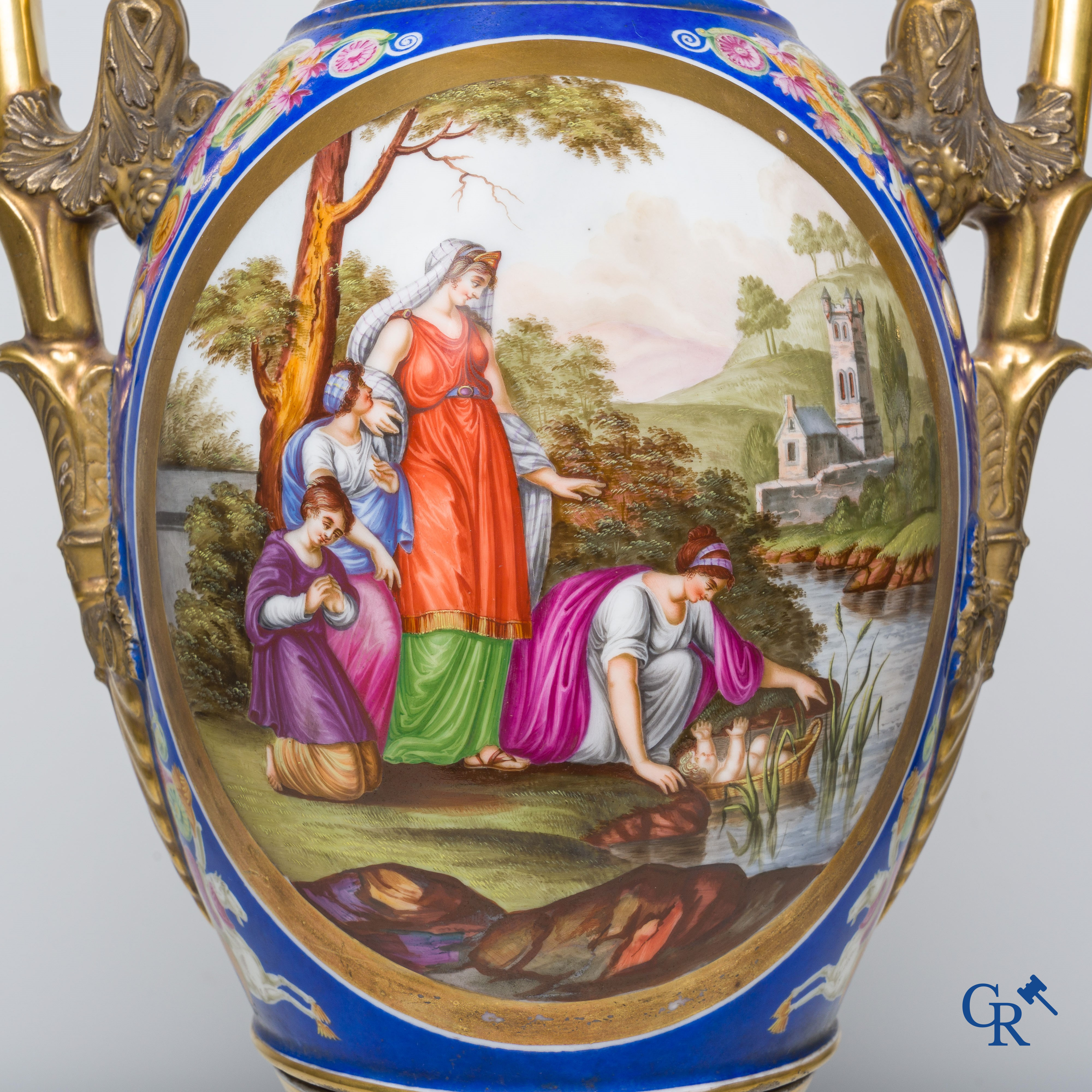 Empire, a pair of imposing multicolored decorated and gilded vases. Early 19th century.