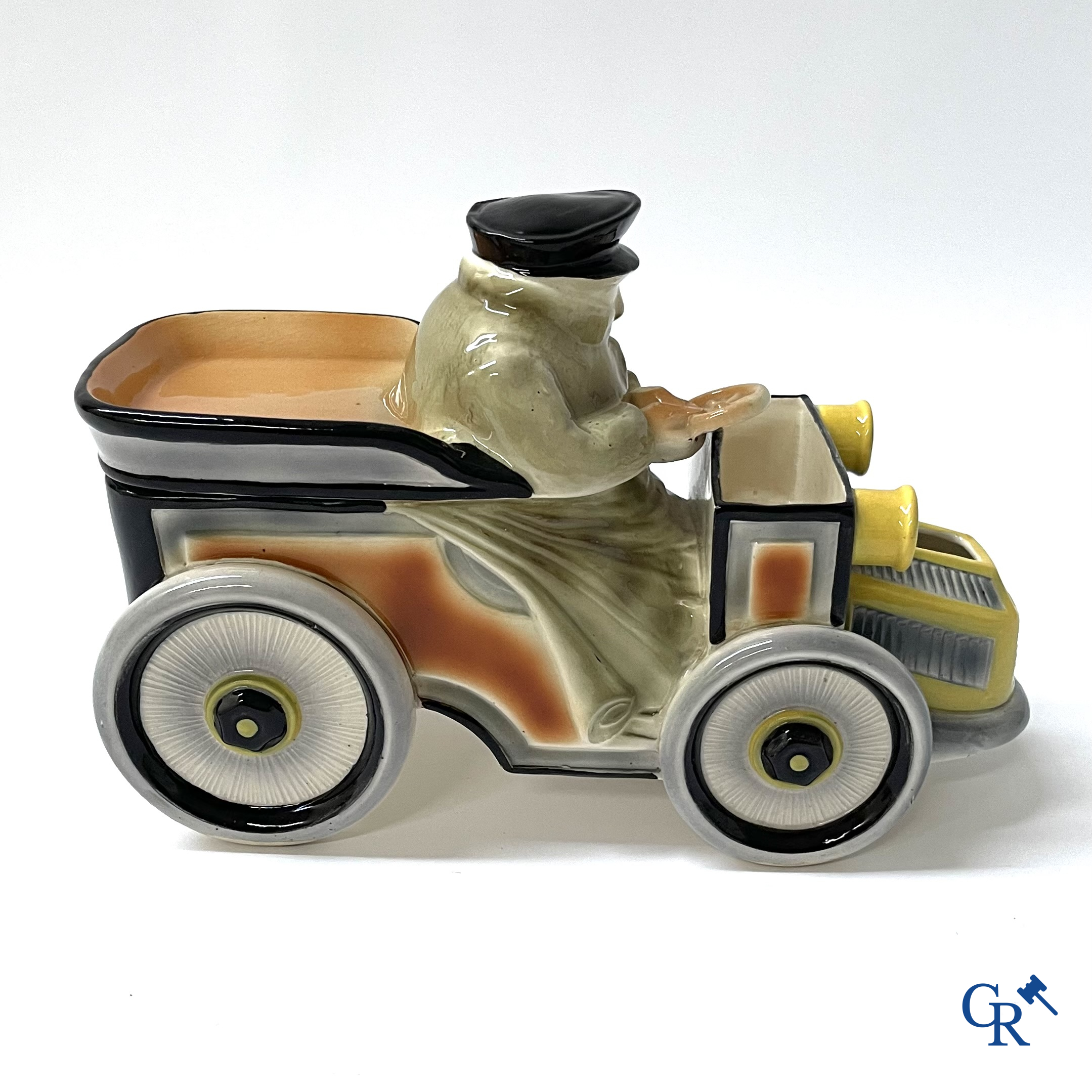 Faïencerie Fives Lille. L'Automobiliste, a large tobacco jar in the shape of a vintage car with a driver. Around 1910.