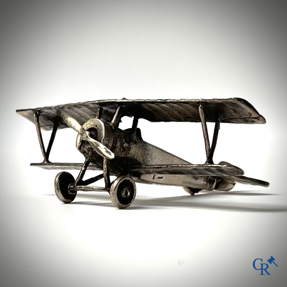 A miniature model of a double-decker aircraft in silver 800°/00. Circa 1930.