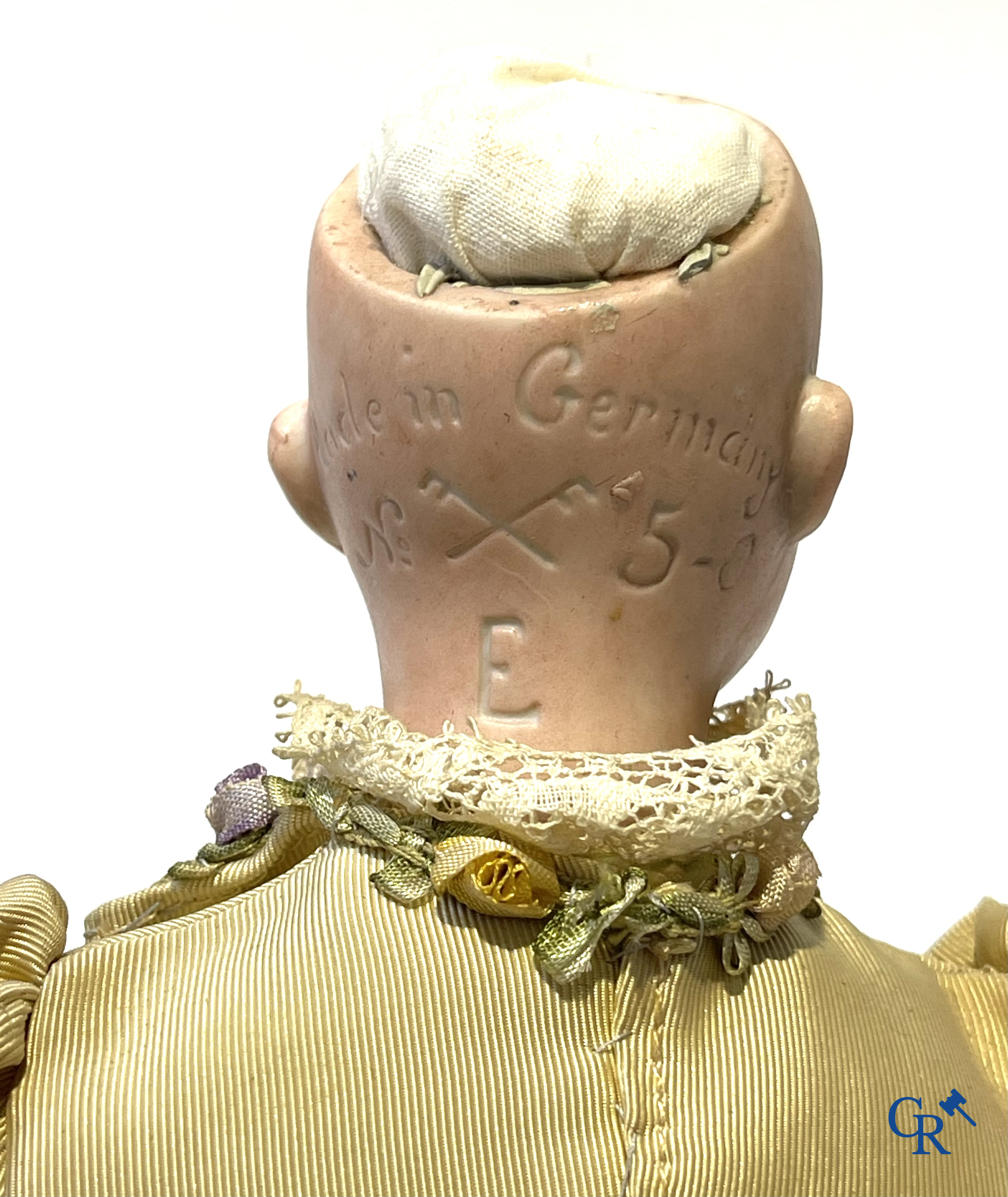 Old toys, 2 antique dolls with porcelain head and an automaton with music. Marked.