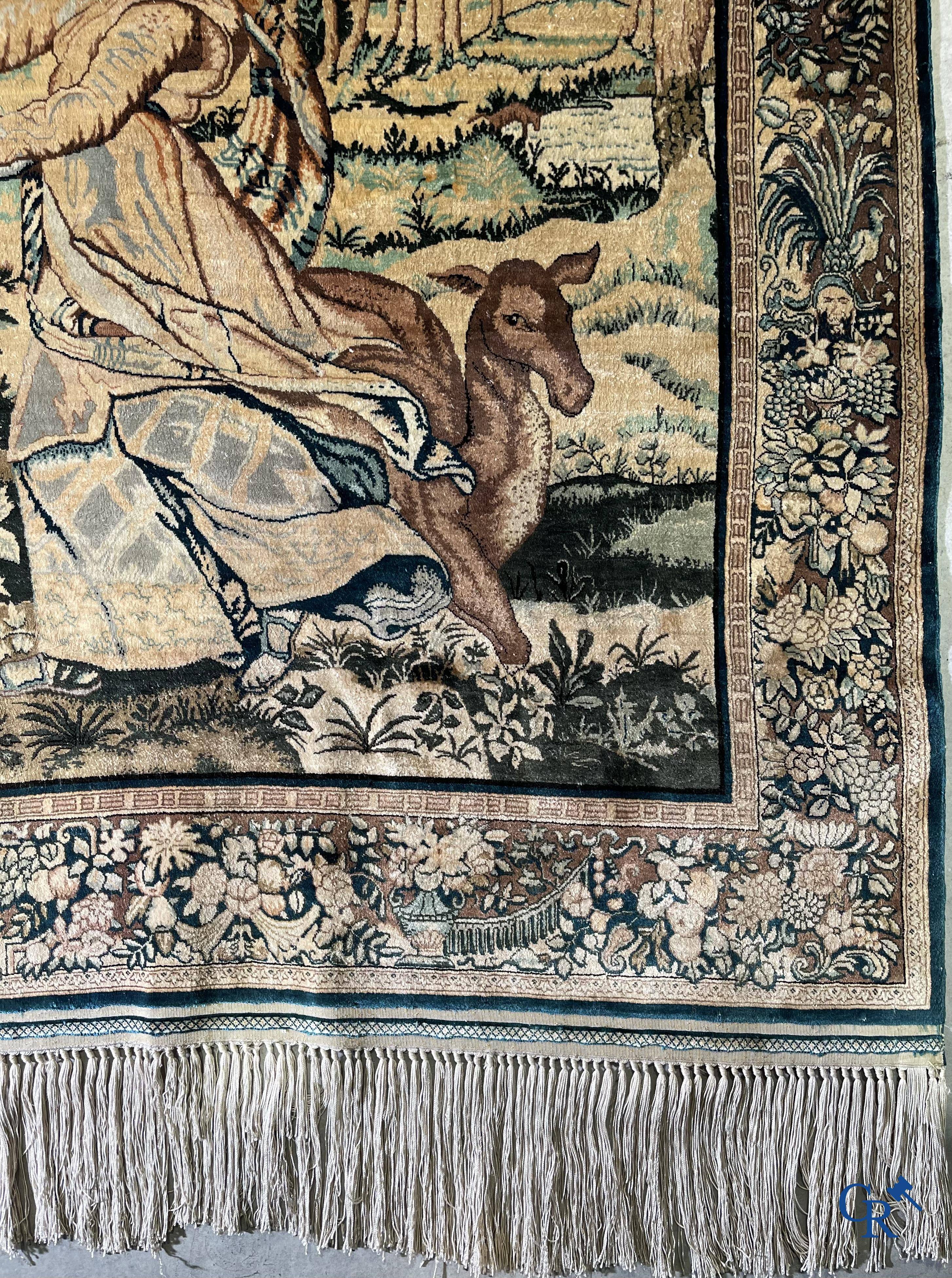 Oriental carpets, a finely knotted silk tapestry with Renaissance scenes. Signed.