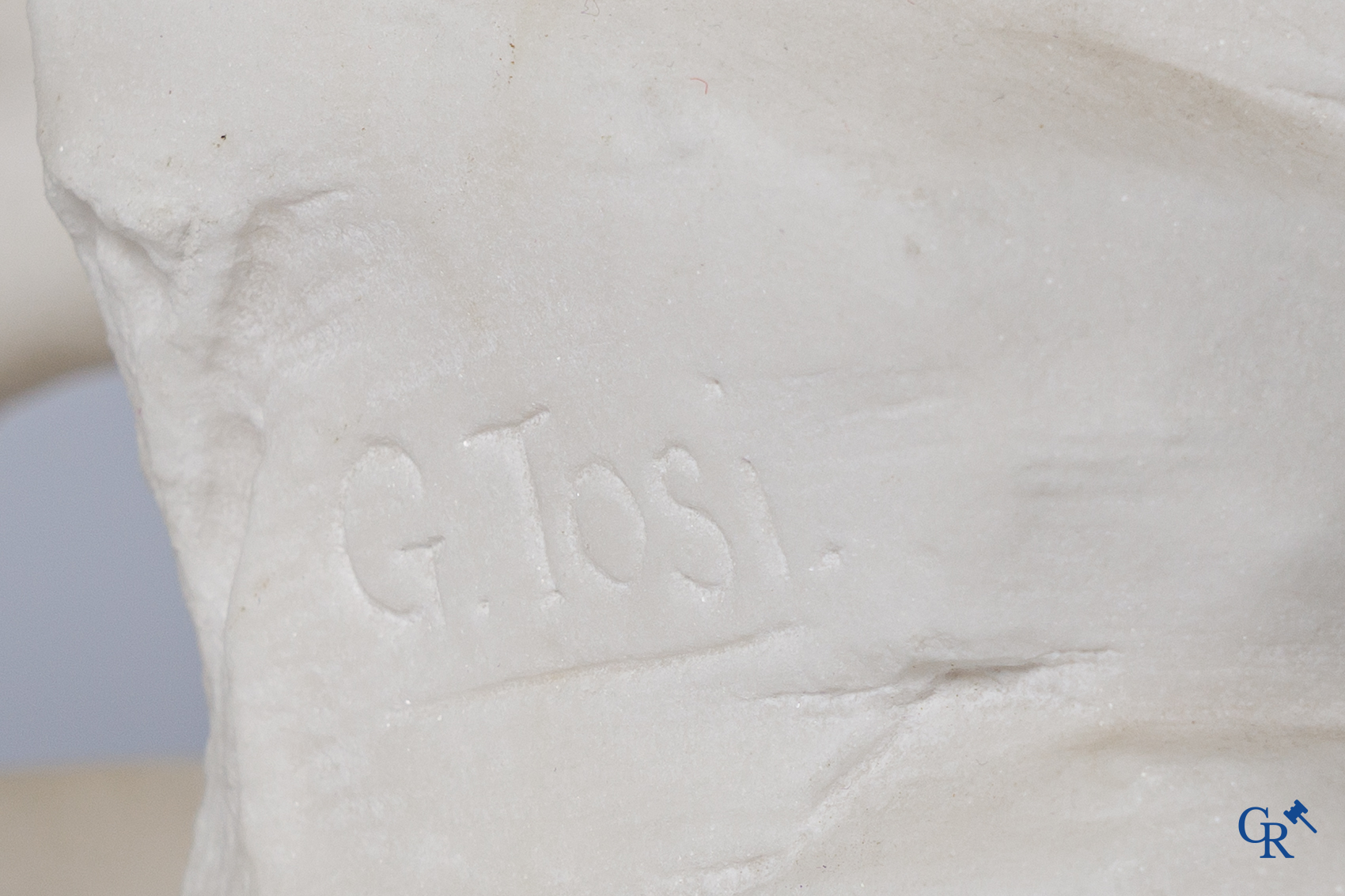 G. Tosi, Beautiful statue in carved marble, seated cupid at wall fountain. Circa 1900.