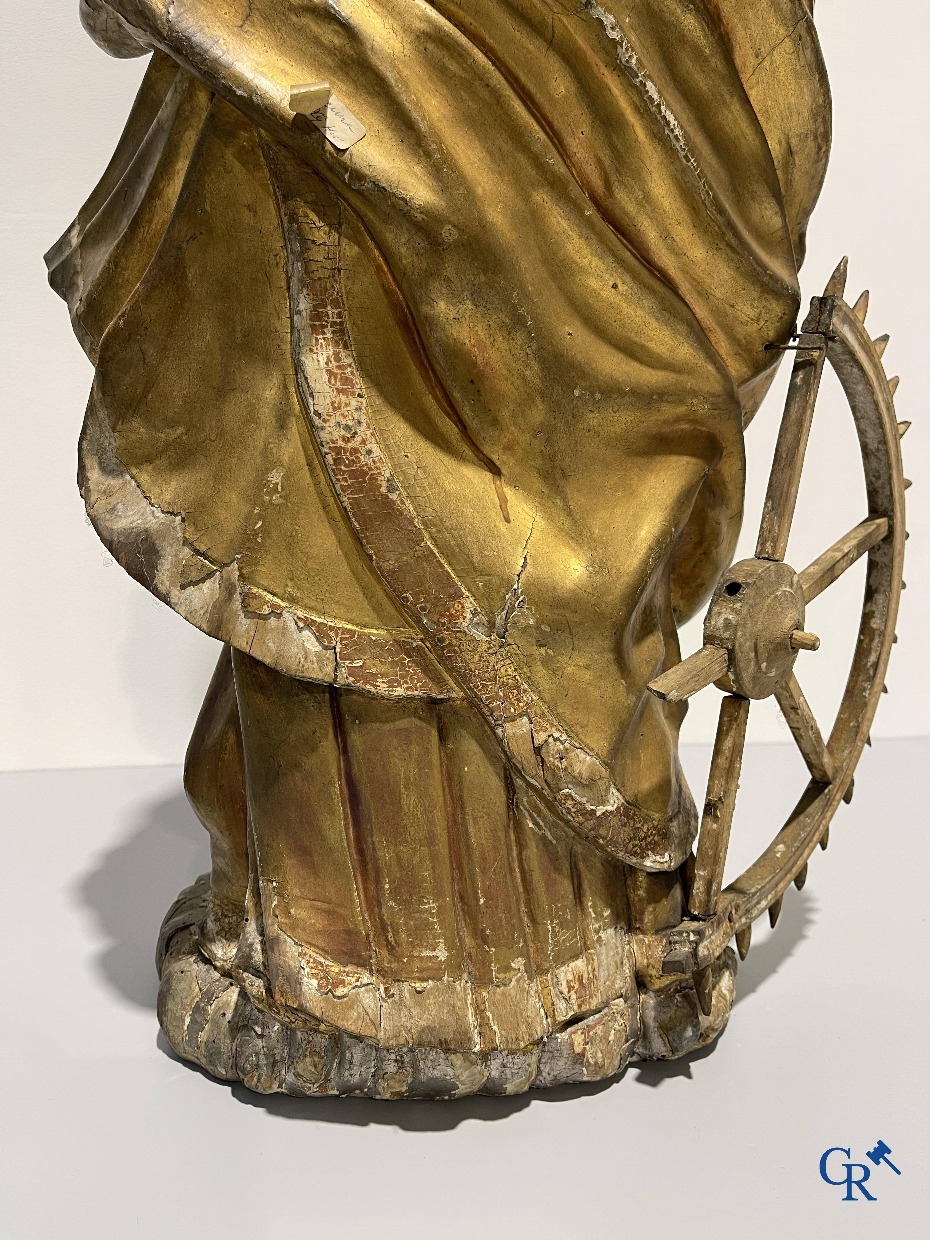 Exceptionally polychrome wooden statue of Saint Catherine of Alexandria with glass eyes, 18th century.