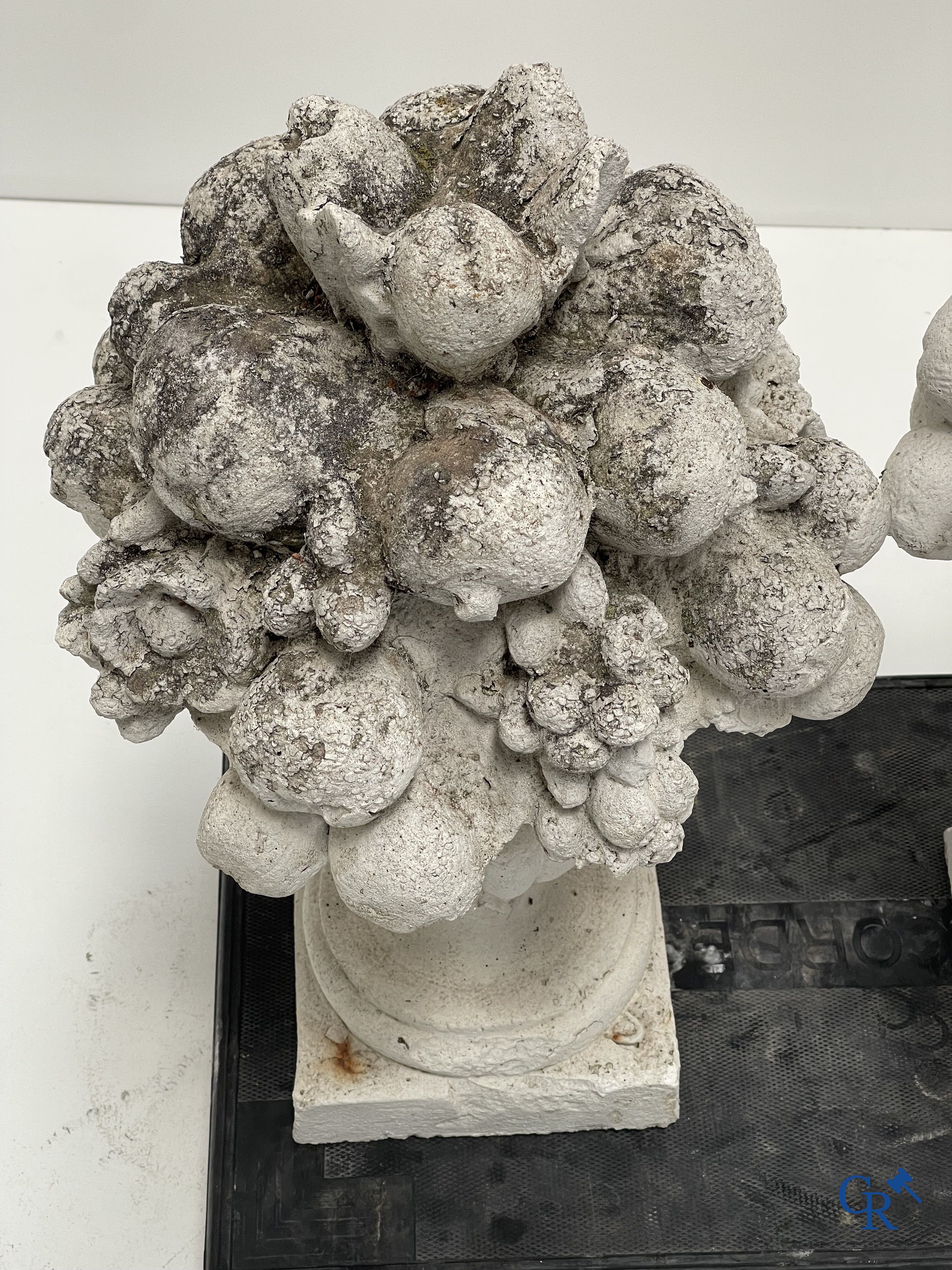 Garden decoration, a pair of stone garden ornaments.