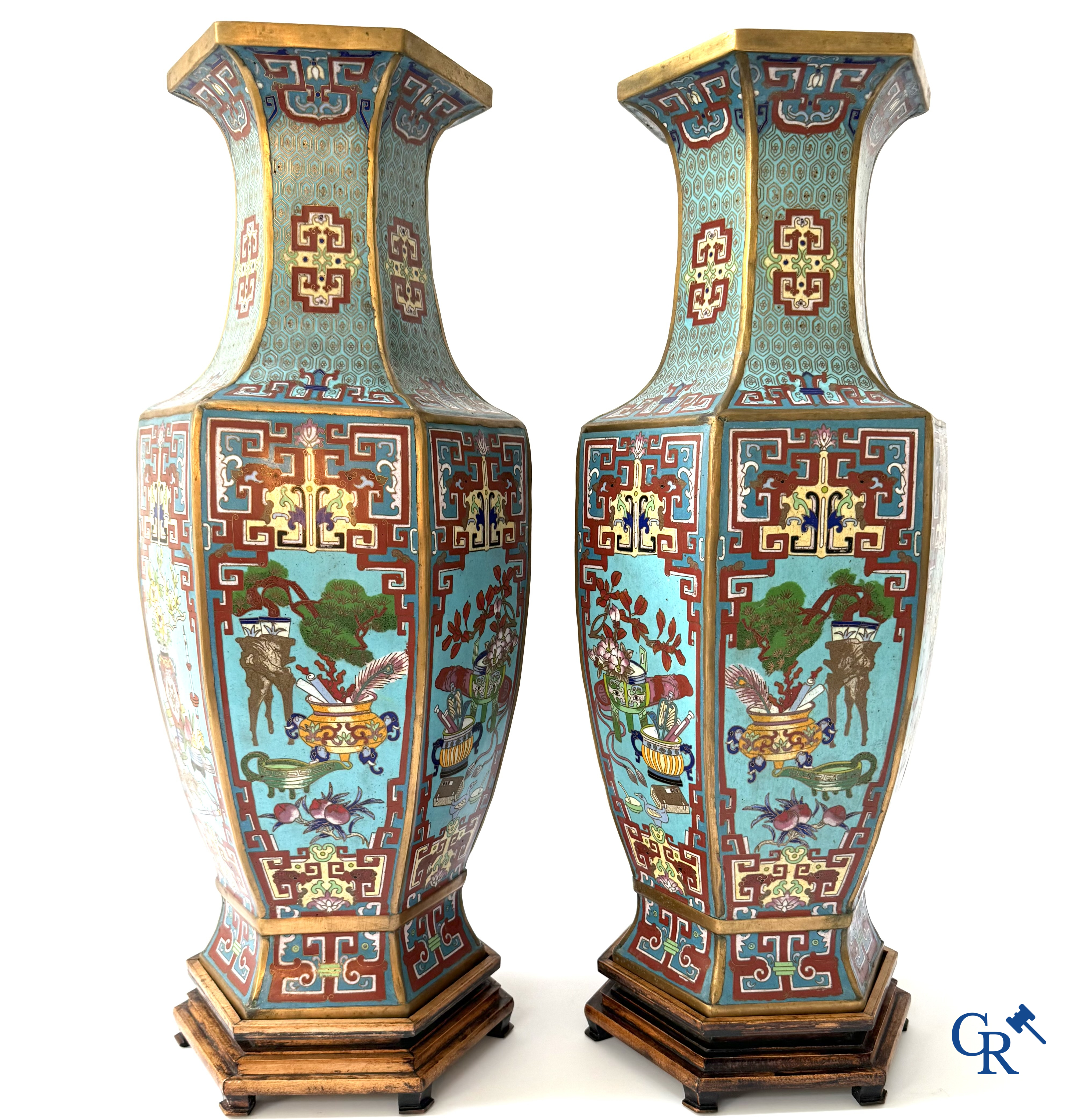 Asian Art, a large pair of hexagonal Chinese cloisonné vases with a decor of antiques.