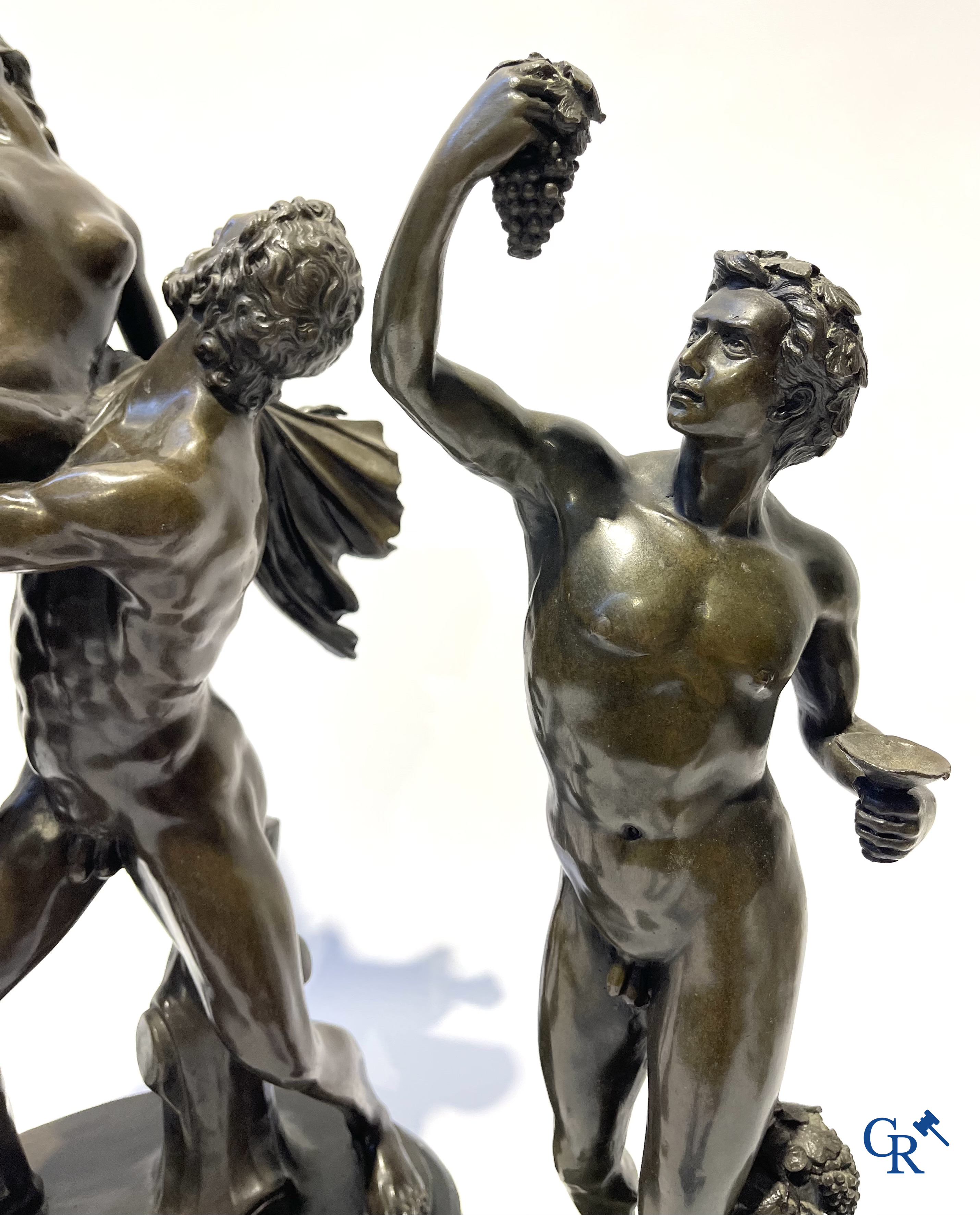 3 bronze statues after the antiques on a marble base. 20th century.