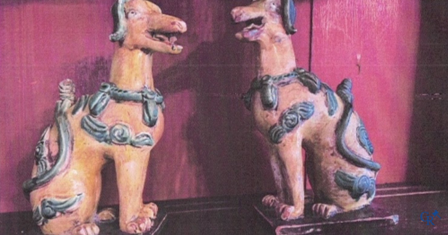 Asian Art, Chine. A pair of seated enamelled terra cotta dogs.